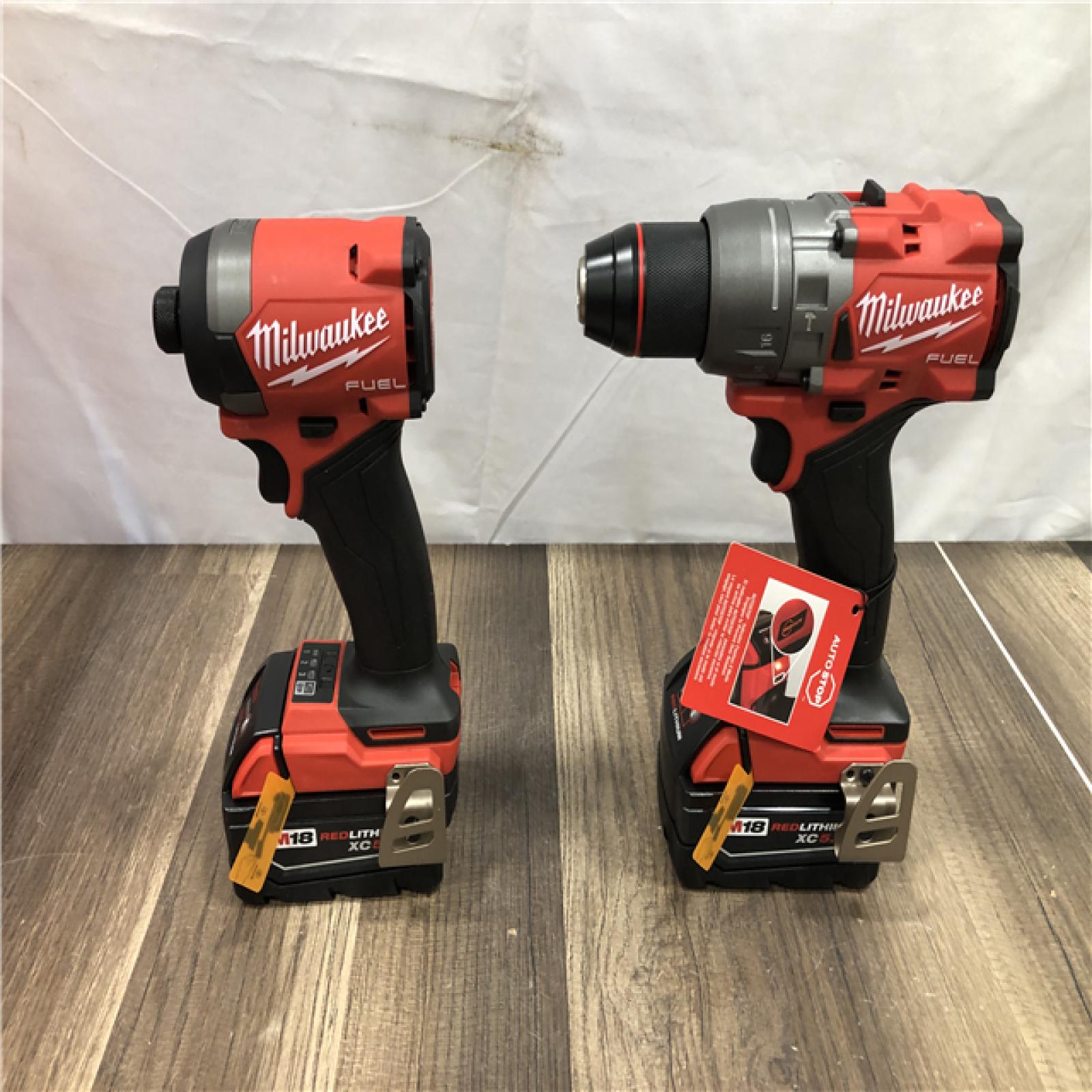AS-IS Milwaukee FUEL 18V Lithium-Ion Brushless Cordless Hammer Drill and Impact Driver Combo Kit
