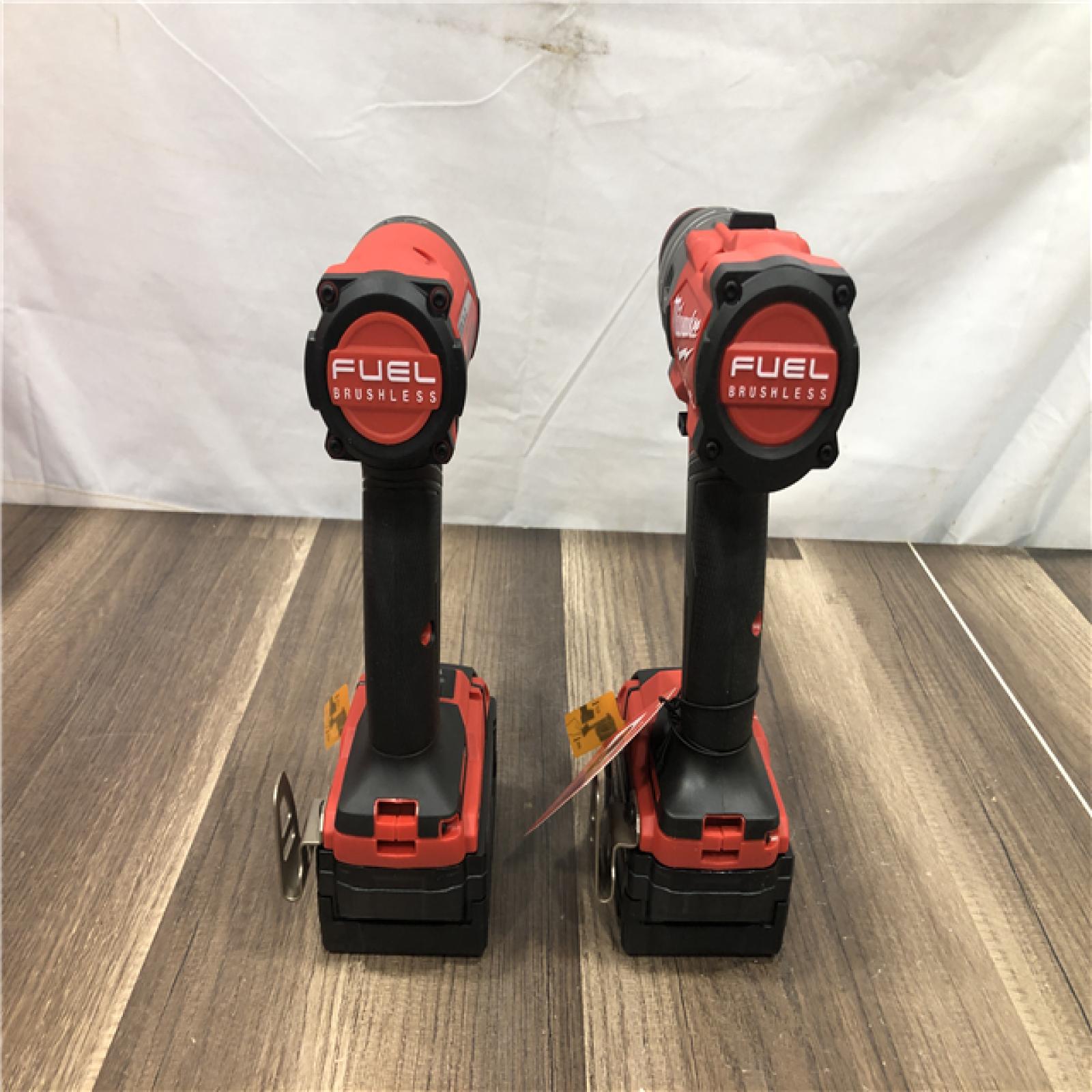 AS-IS Milwaukee FUEL 18V Lithium-Ion Brushless Cordless Hammer Drill and Impact Driver Combo Kit