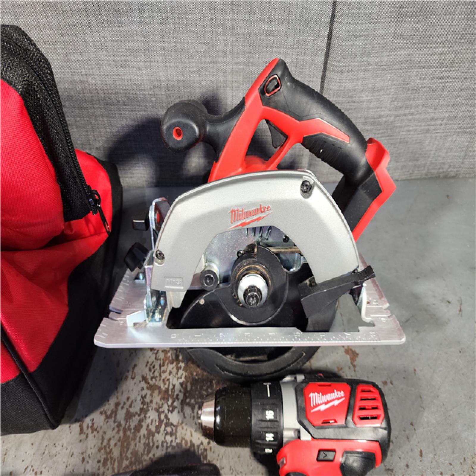 HOUSTON LOCATION - AS-IS Milwaukee M18 18-Volt Lithium-Ion Cordless Combo Tool Kit (5-Tool) with (1) 3.0Ah and (1) 1.5Ah Battery, (1) Charger, (1) Tool Bag