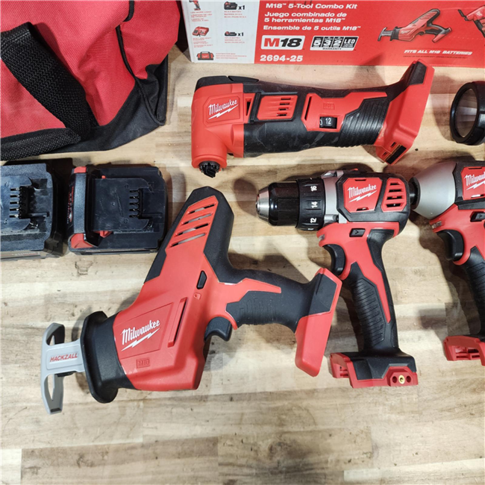 HOUSTON LOCATION - AS-IS M18 18V Lithium-Ion Cordless Combo Kit (5-Tool) with (2) Batteries  Charger and Tool Bag
