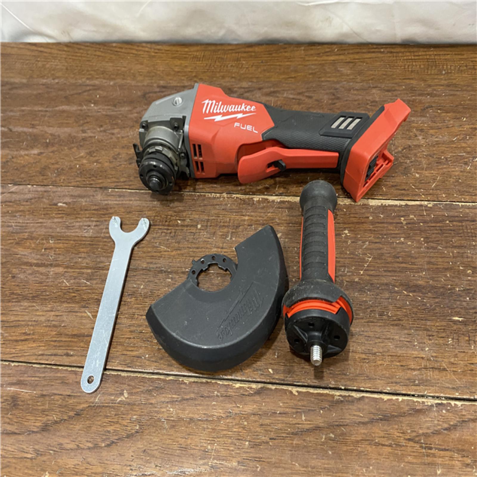 AS-IS Milwaukee 2880-20 M18 FUEL 18-Volt Lithium-Ion Brushless Cordless 4-1/2 in./5 in. Grinder W/Paddle Switch (Tool-Only)