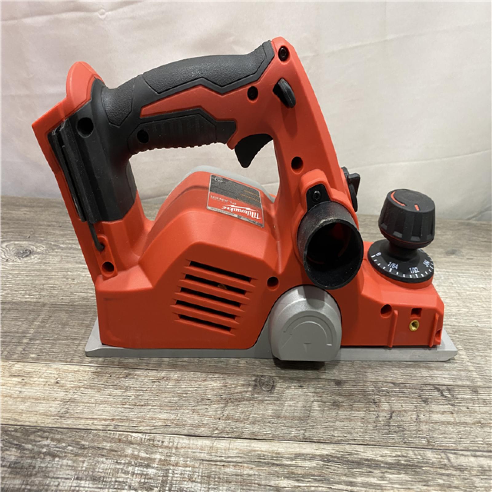 AS-IS Milwaukee 18V Lithium-Ion Cordless 3-1/4 in. Planer (Tool-Only)