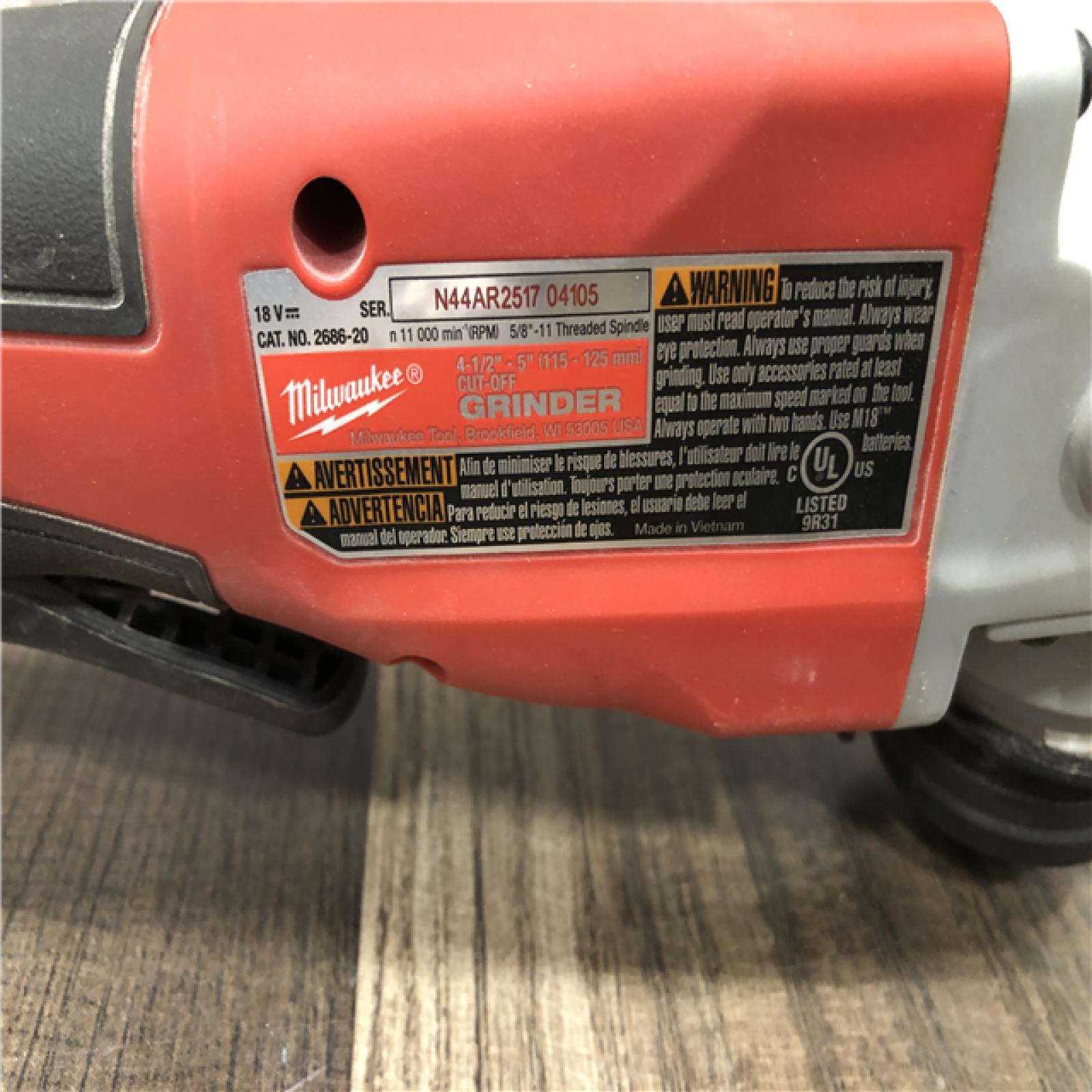AS-IS Milwaukee 18V Lithium-Ion Brushless Cordless 4-1/2 in./5 in. Grinder w/Paddle Switch (Tool-Only)