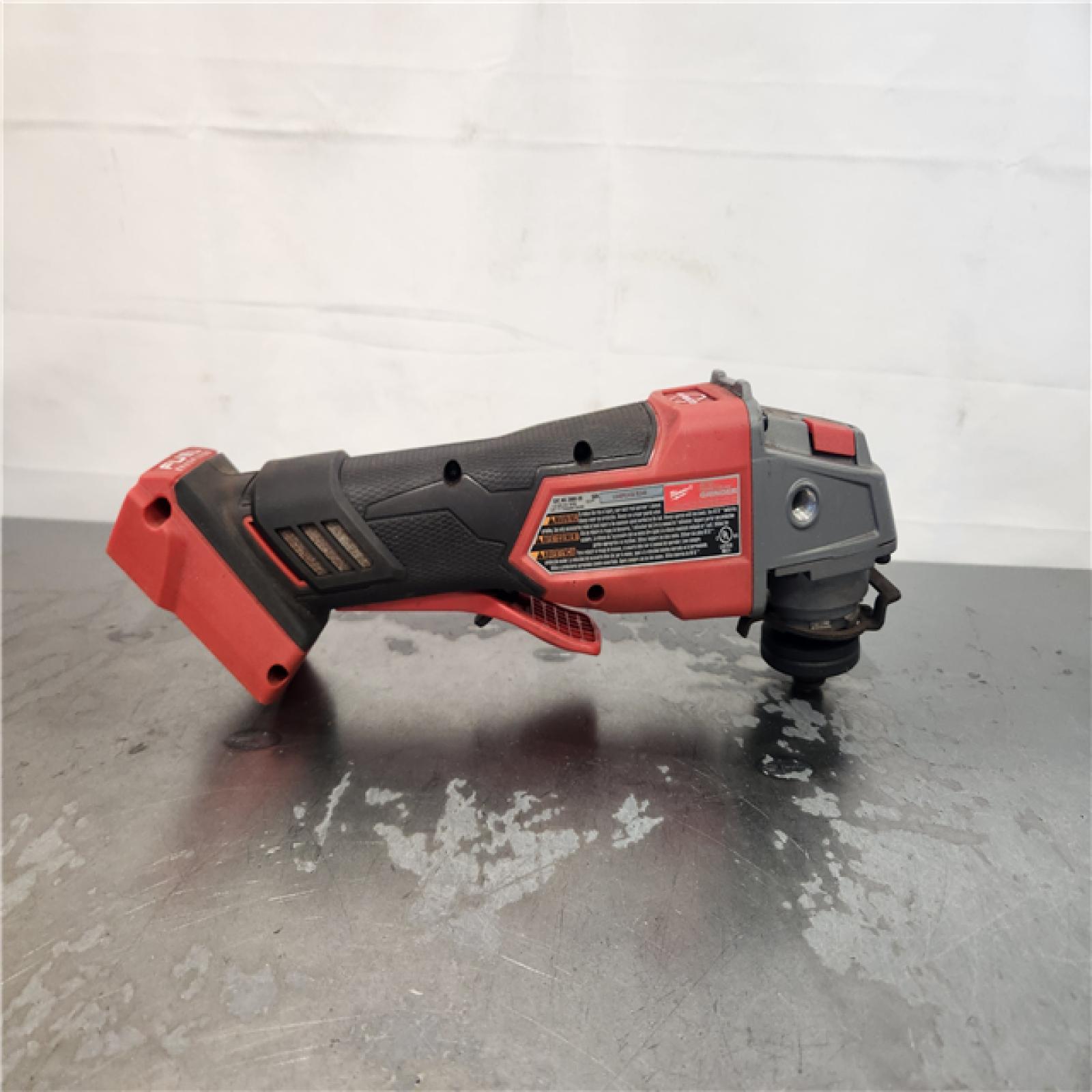 AS-IS- Milwaukee FUEL 18-Volt Lithium-Ion Brushless Cordless 4-1/2 in./5 in. Grinder W/Paddle Switch (Tool-Only)