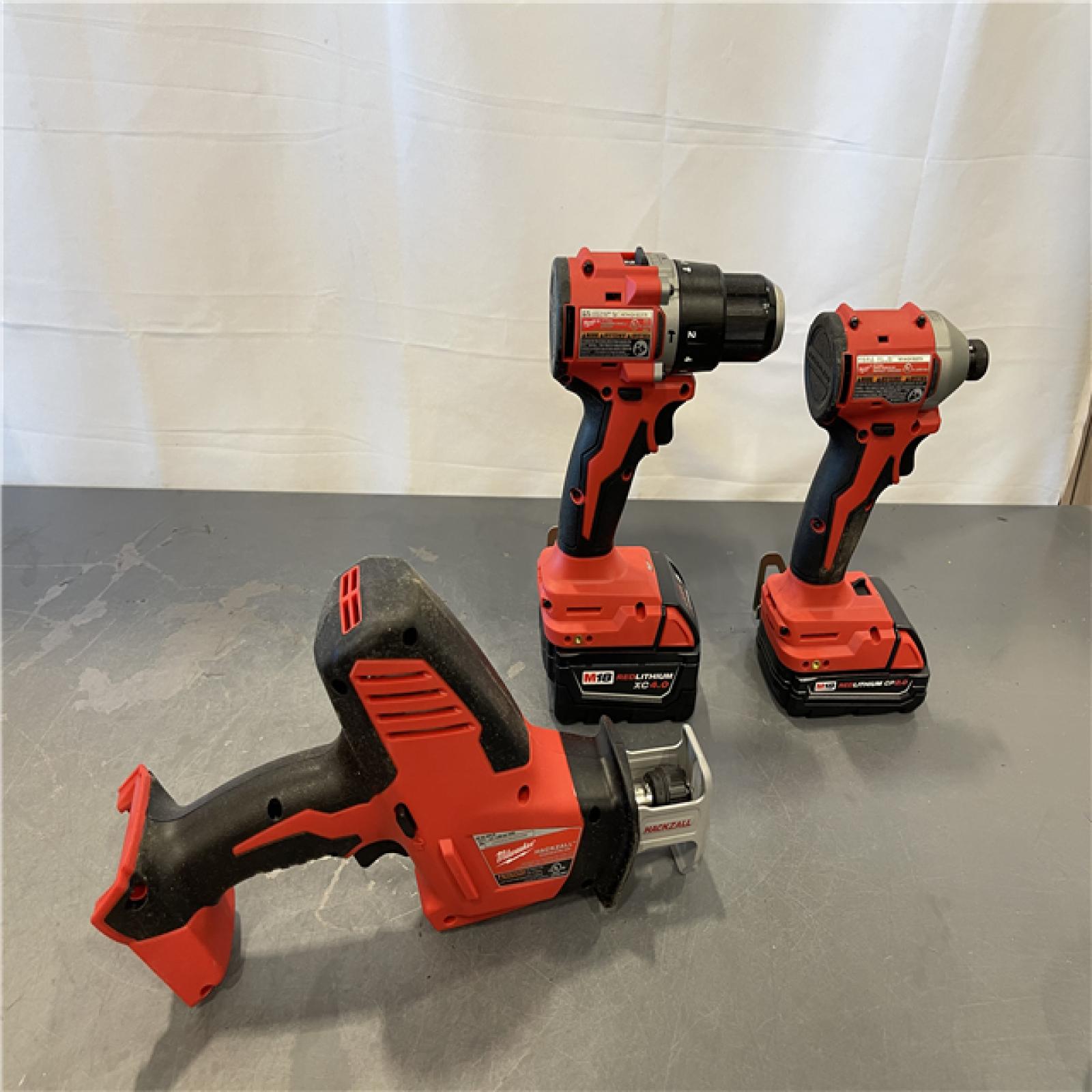 AS-IS - Milwaukee M18 18-Volt Lithium-Ion Brushless Cordless Combo 4 Tool Kit