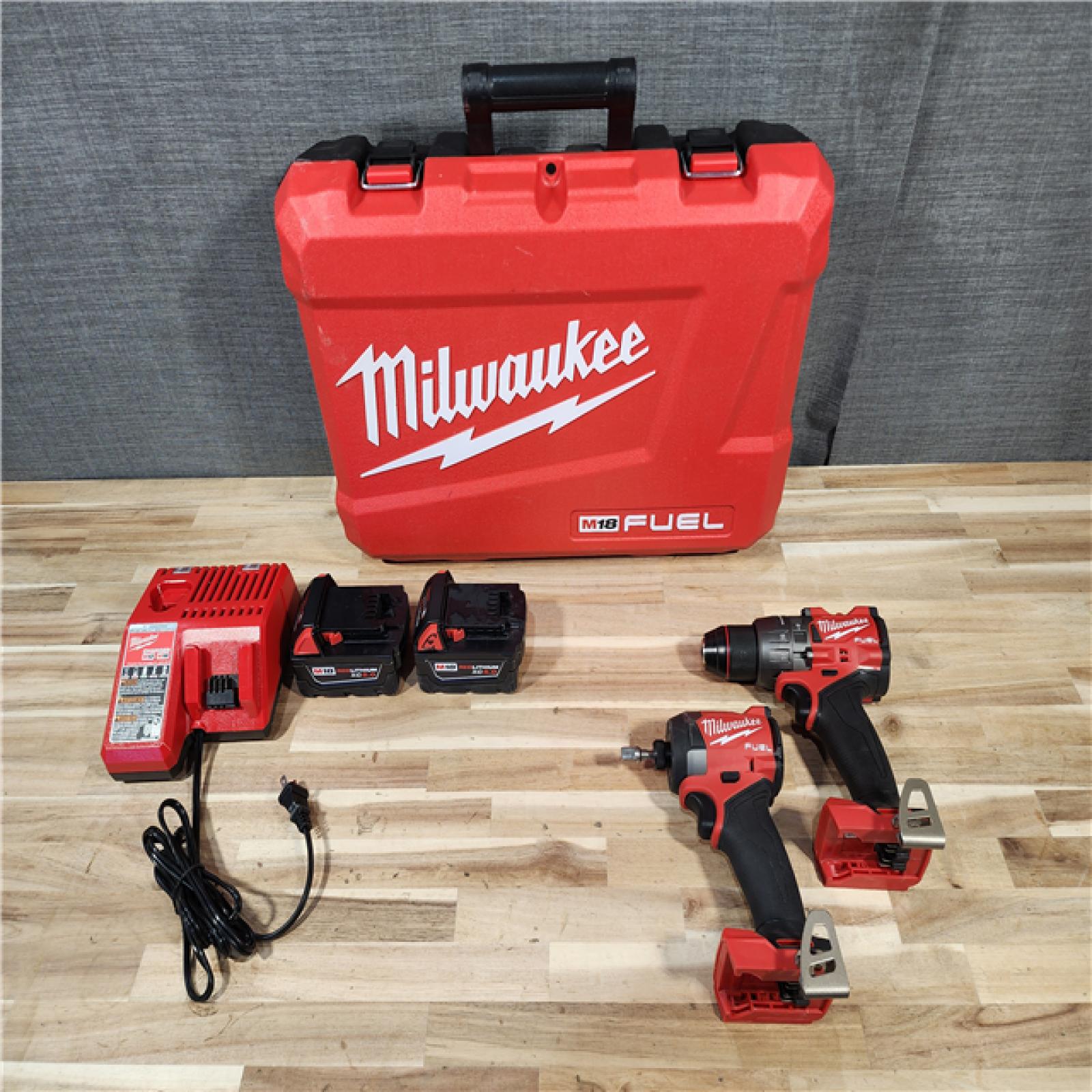 HOUSTON LOCATION - AS-IS Milwaukee FUEL 18V Lithium-Ion Brushless Cordless Hammer Drill and Impact Driver Combo Kit