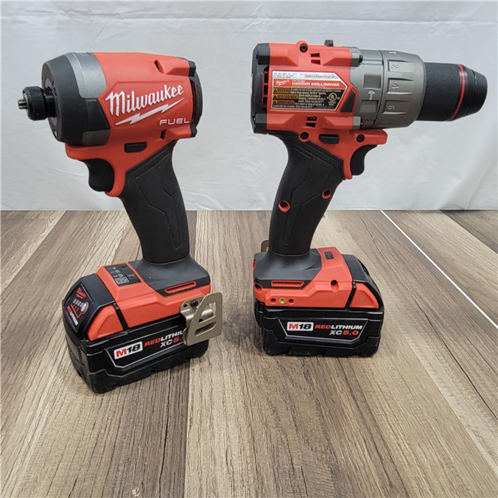 AS-IS Milwaukee M18 FUEL 18V Lithium-Ion Brushless Cordless Hammer Drill and Impact Driver Combo Kit (2-Tool) with 2 Batteries