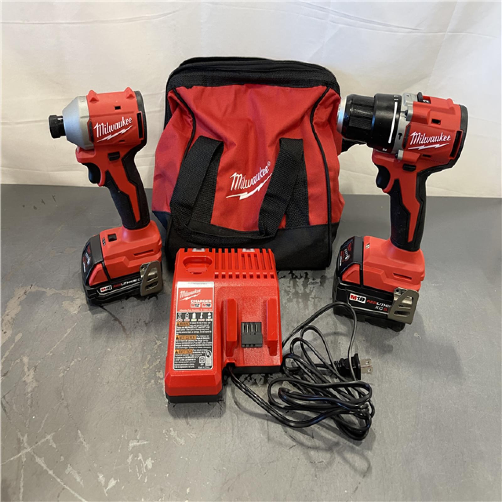 AS-IS - Milwaukee M18 18-Volt Lithium-Ion Brushless Cordless Compact Hammer Drill/Impact Combo Kit