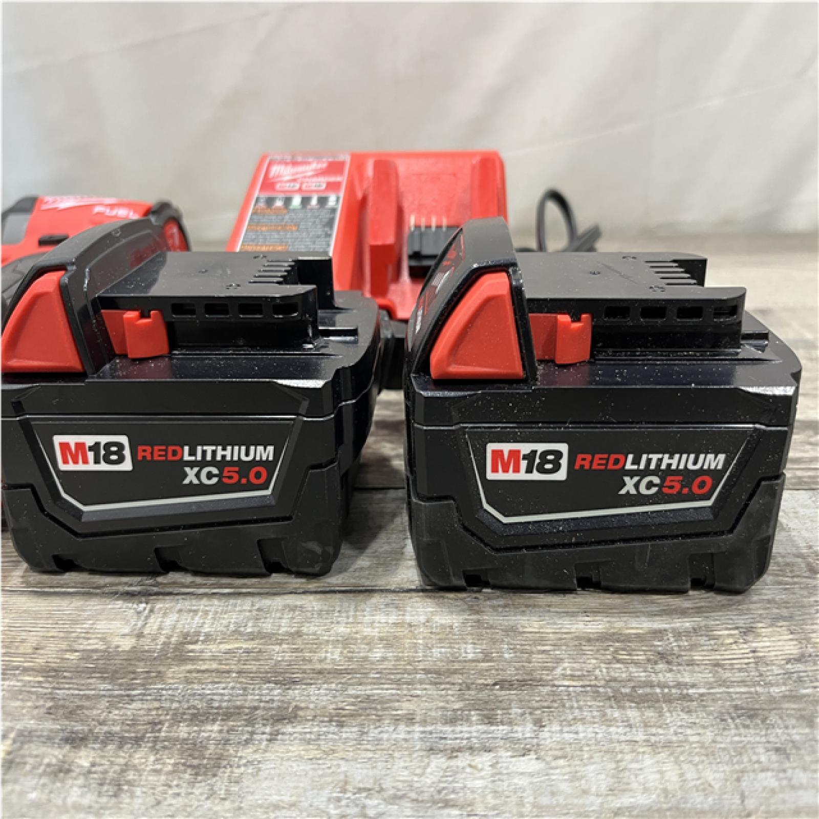 AS-IS Milwaukee FUEL 18V Lithium-Ion Brushless Cordless 1/4 in. Hex Impact Driver Kit