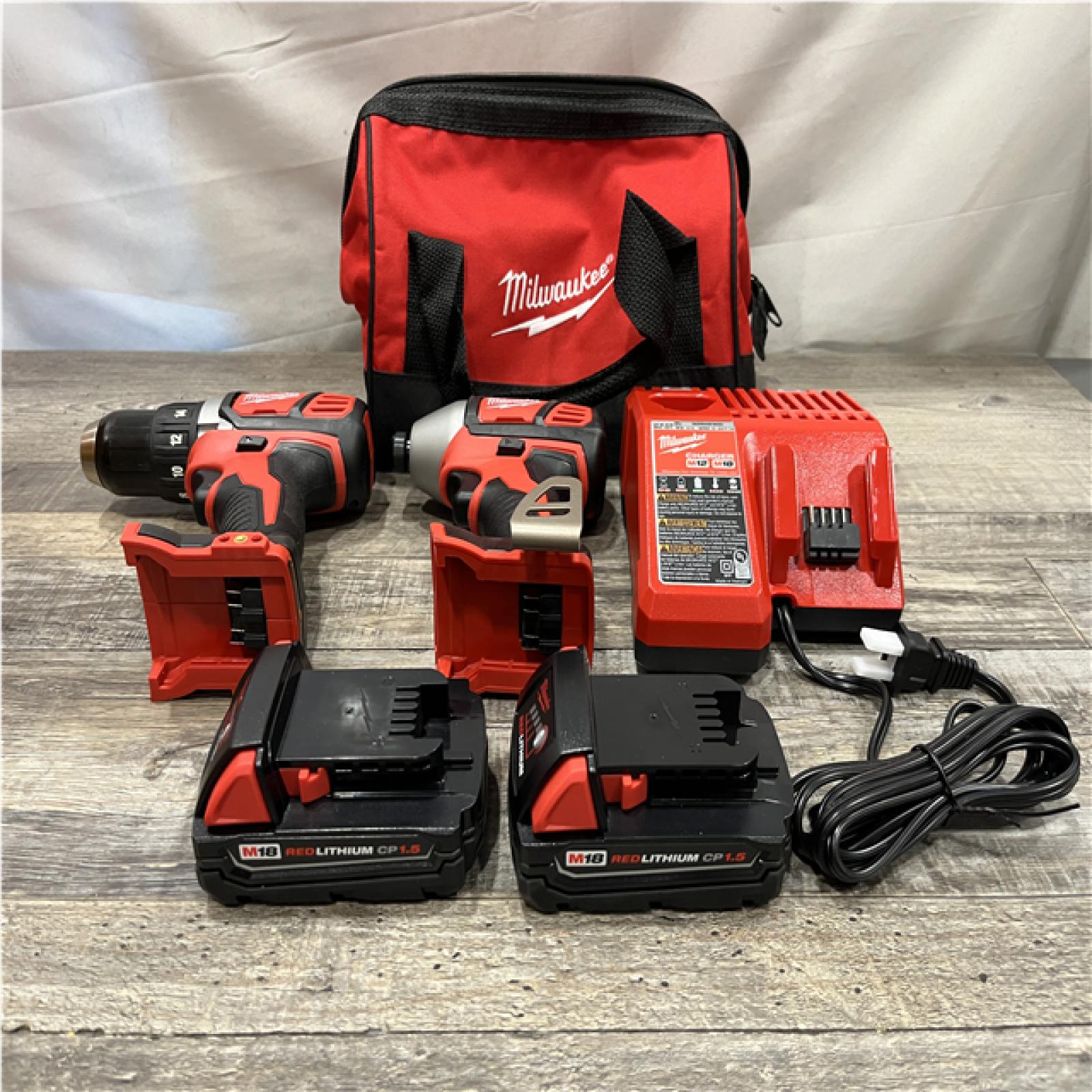 AS-IS Milwaukee 18V Lithium-Ion Cordless Drill Driver/Impact Driver Combo Kit