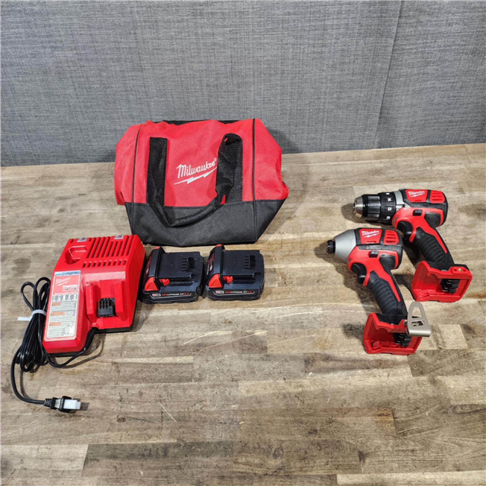 HOUSTON LOCATION - AS-IS Milwaukee 18V Cordless Brushed 2-Tool Drill/Driver and Impact Driver Kit