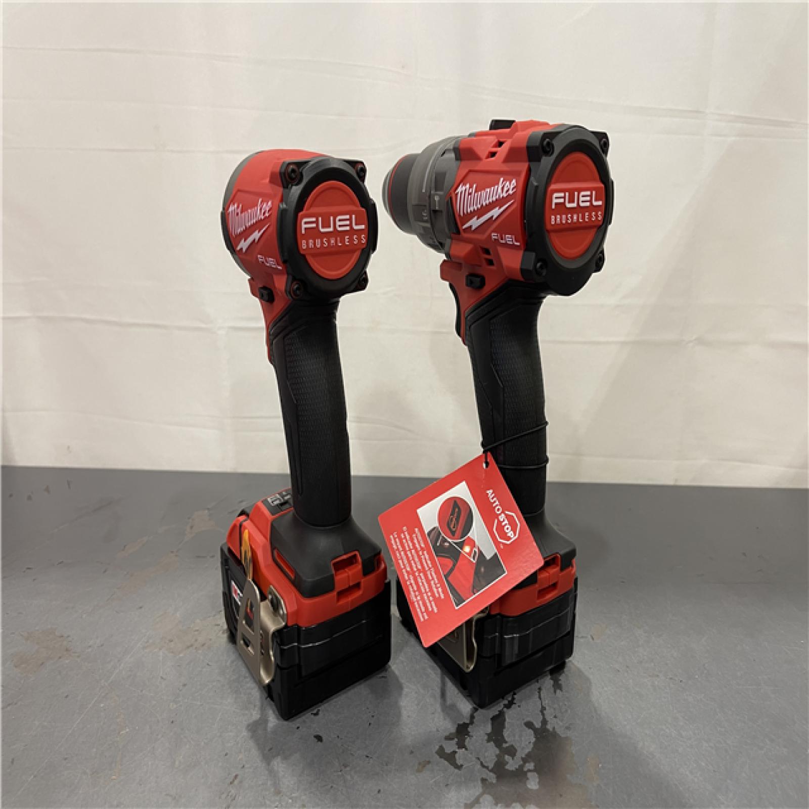 AS-IS - MILWAUKEE FUEL 18V Lithium-Ion Brushless Cordless Hammer Drill and Impact Driver Combo Kit