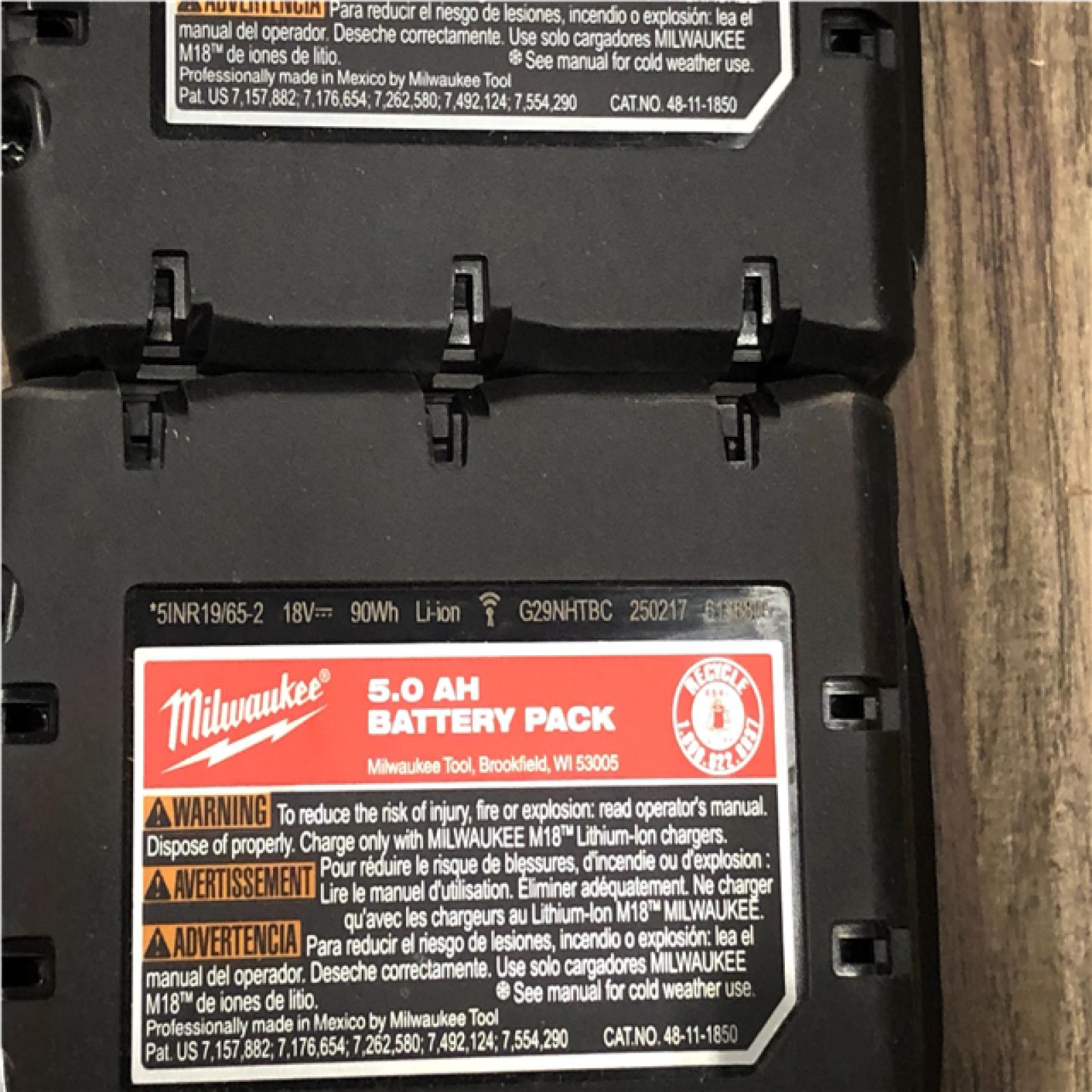 AS-IS Milwaukee 18-Volt Lithium-Ion XC Starter Kit with (2) 5.0Ah Batteries and Charger