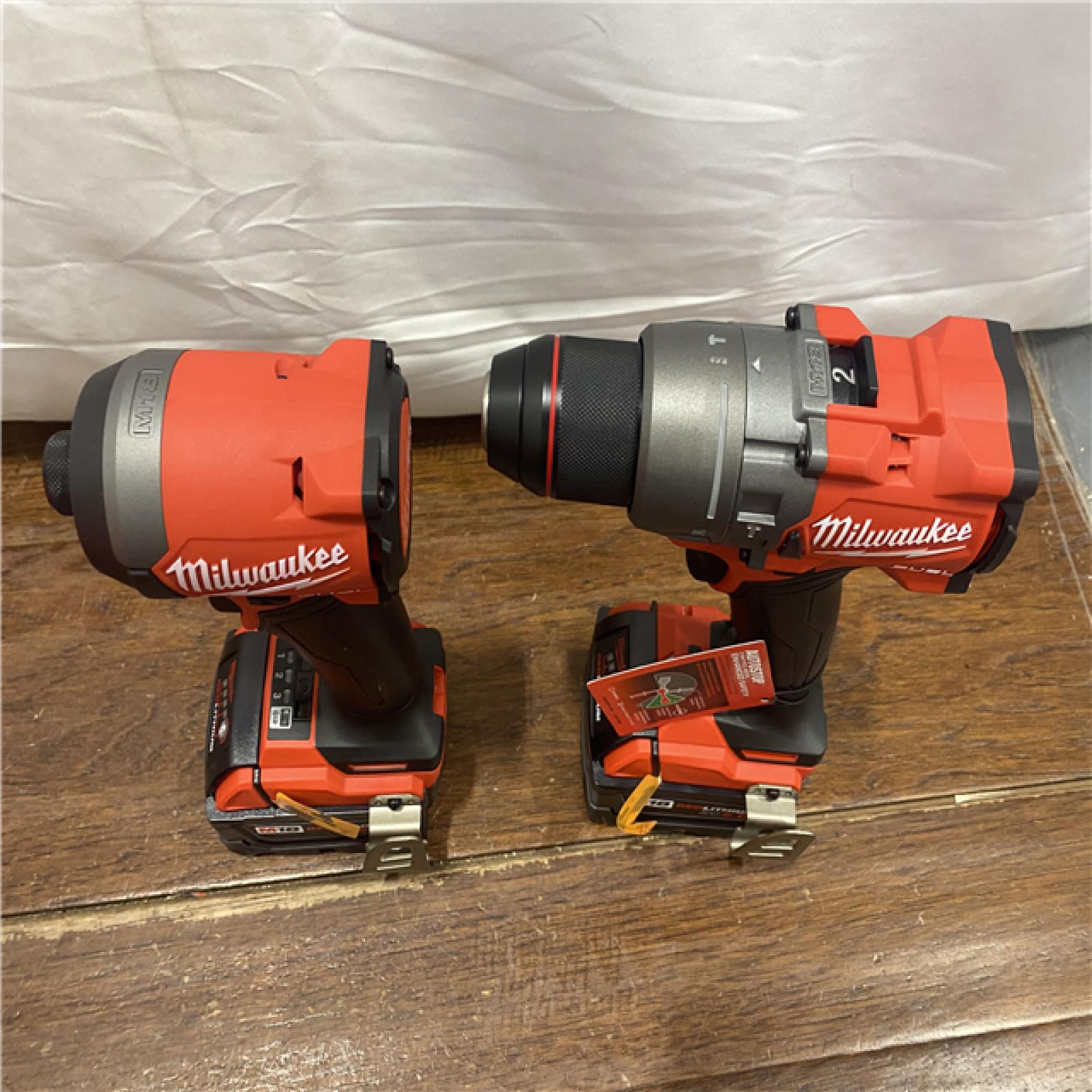 AS-IS MILWAUKEE M18 FUEL 18V Lithium-Ion Brushless Cordless Hammer Drill and Impact Driver Combo Kit (2-Tool) with 2 Batteries