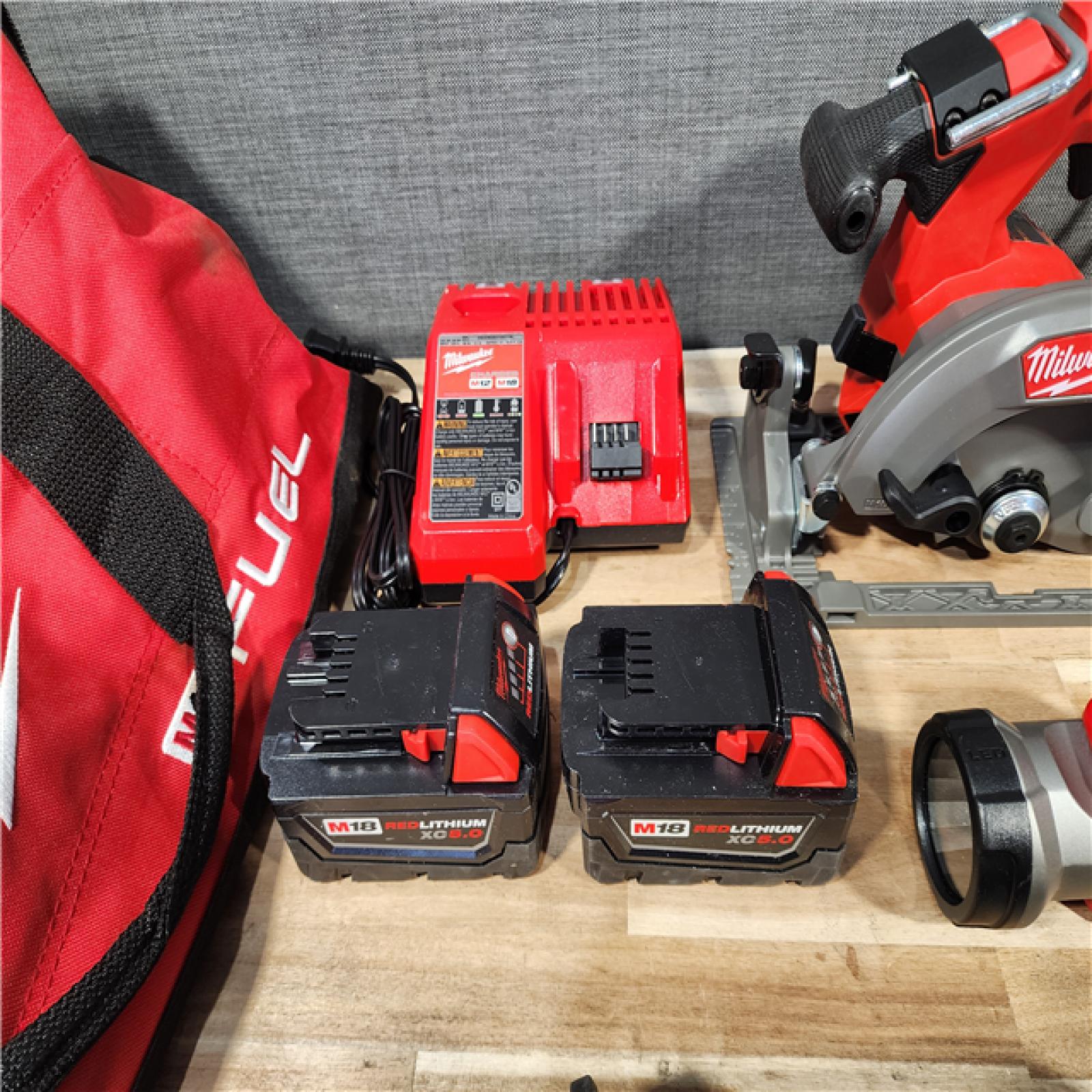 HOUSTON LOCATION - AS-IS M18 FUEL 18V Lithium-Ion Brushless Cordless Combo Kit (5-Tool) with Two 5.0 Ah Batteries  1 Charger 1 Tool Bag