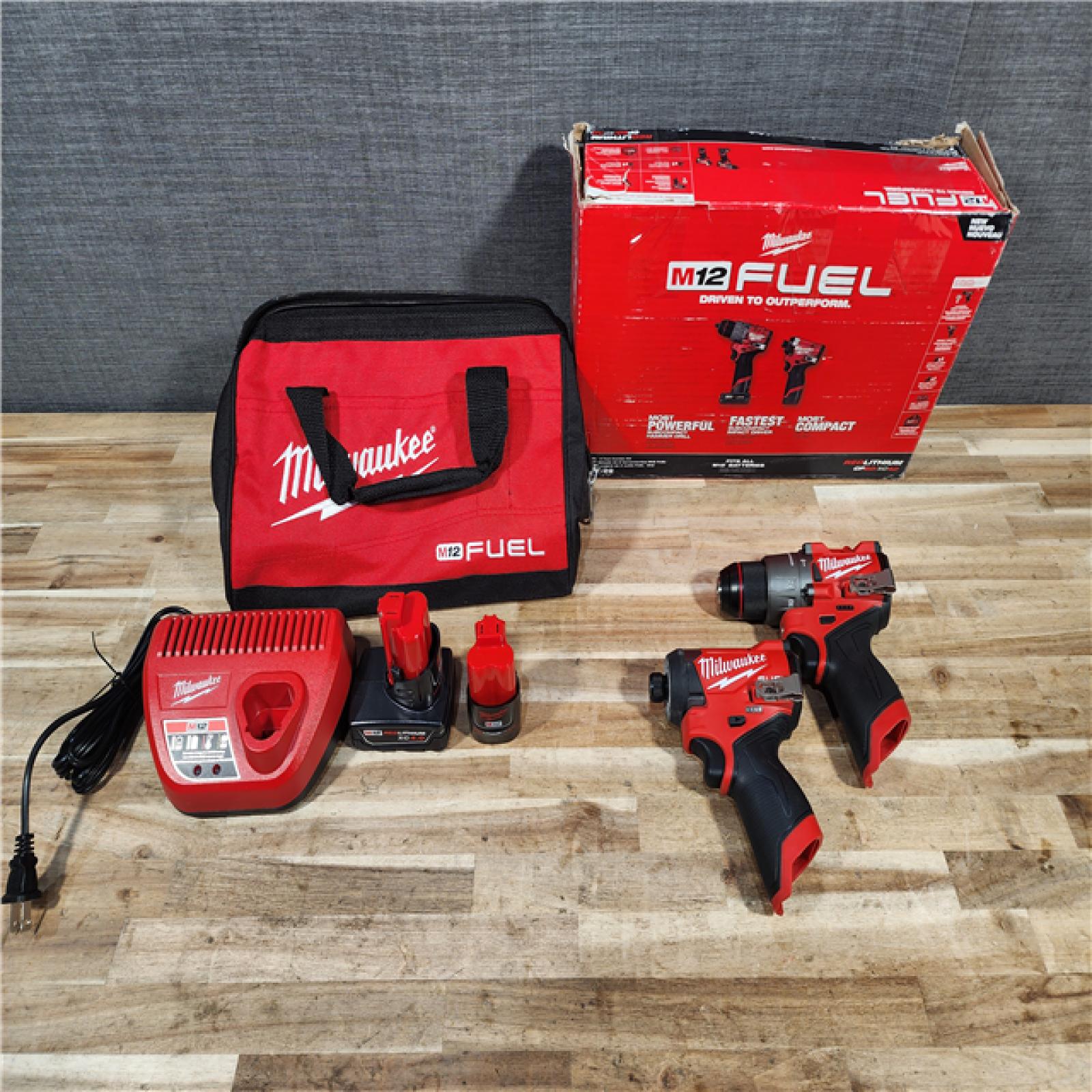 HOUSTON LOCATION - AS-IS Milwaukee  FUEL 12-Volt Lithium-Ion Brushless Cordless Hammer Drill and Impact Driver Combo Kit