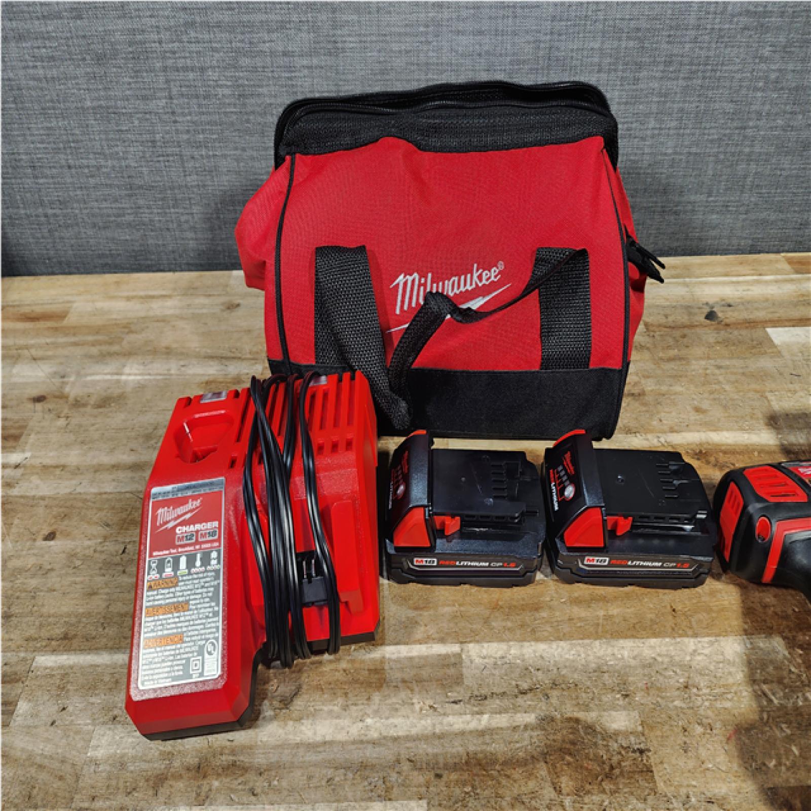 HOUSTON LOCATION - AS - IS Milwaukee 18V Lithium-Ion Cordless Drill Driver/Impact Driver Combo Kit