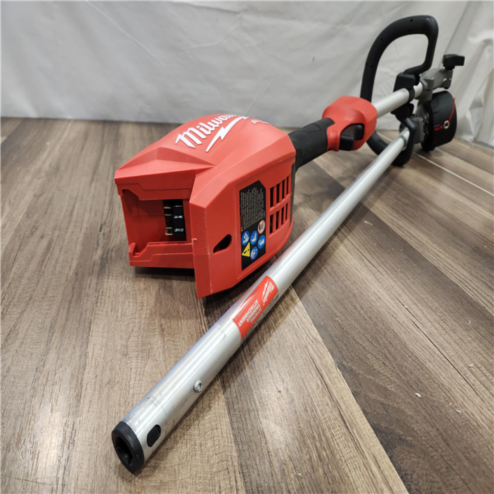 AS-IS- M18 FUEL 18V 16 in. Brushless Cordless Battery Powered String Trimmer W/QUIK-LOK Attachment Capability & 8.0 Ah Battery