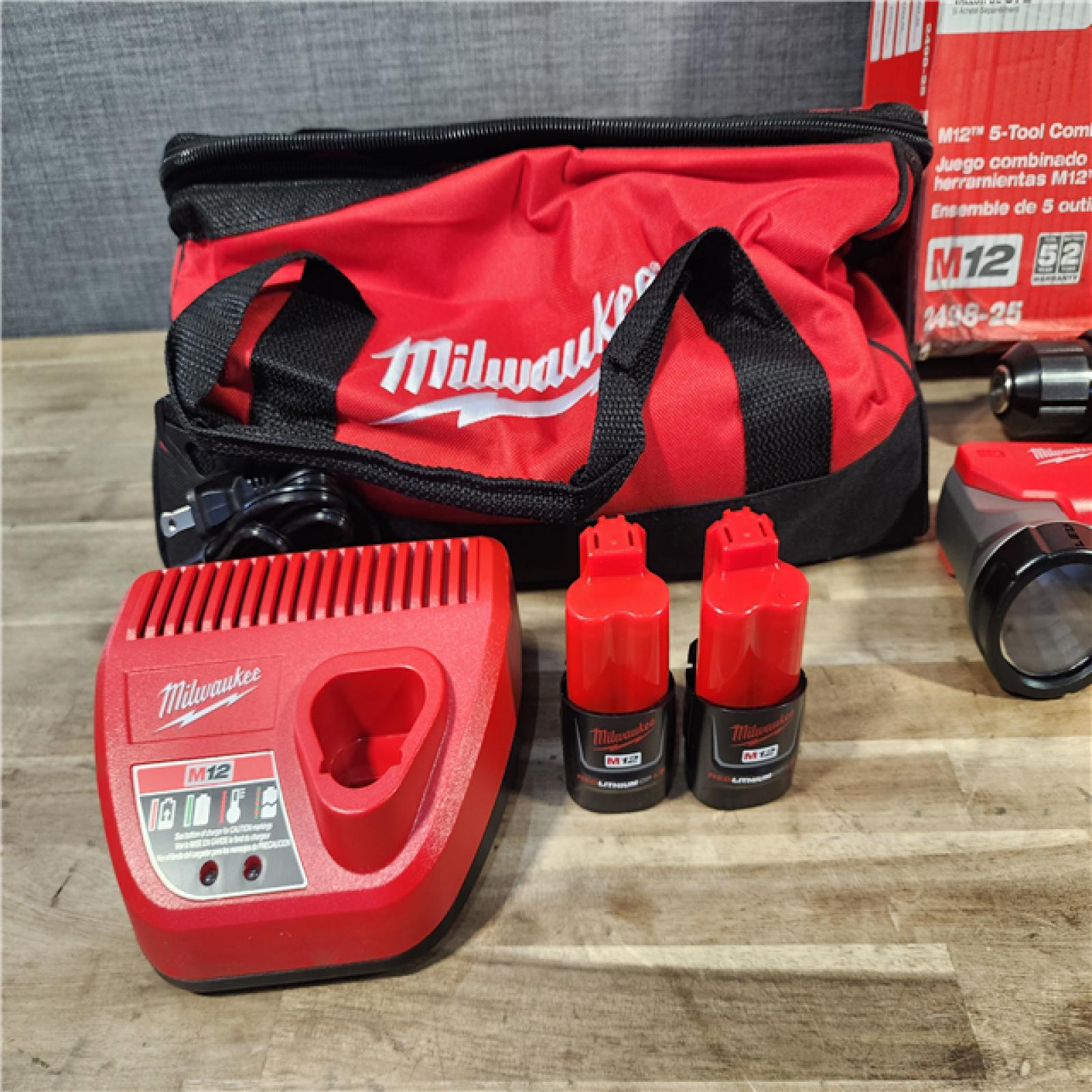 HOUSTON LOCATION - AS-IS (APPEARS LIKE NEW) MILWAUKEE M12 12V Lithium-Ion Cordless Combo Kit (5-Tool) with Two 1.5Ah Batteries, Charger & Tool Bag