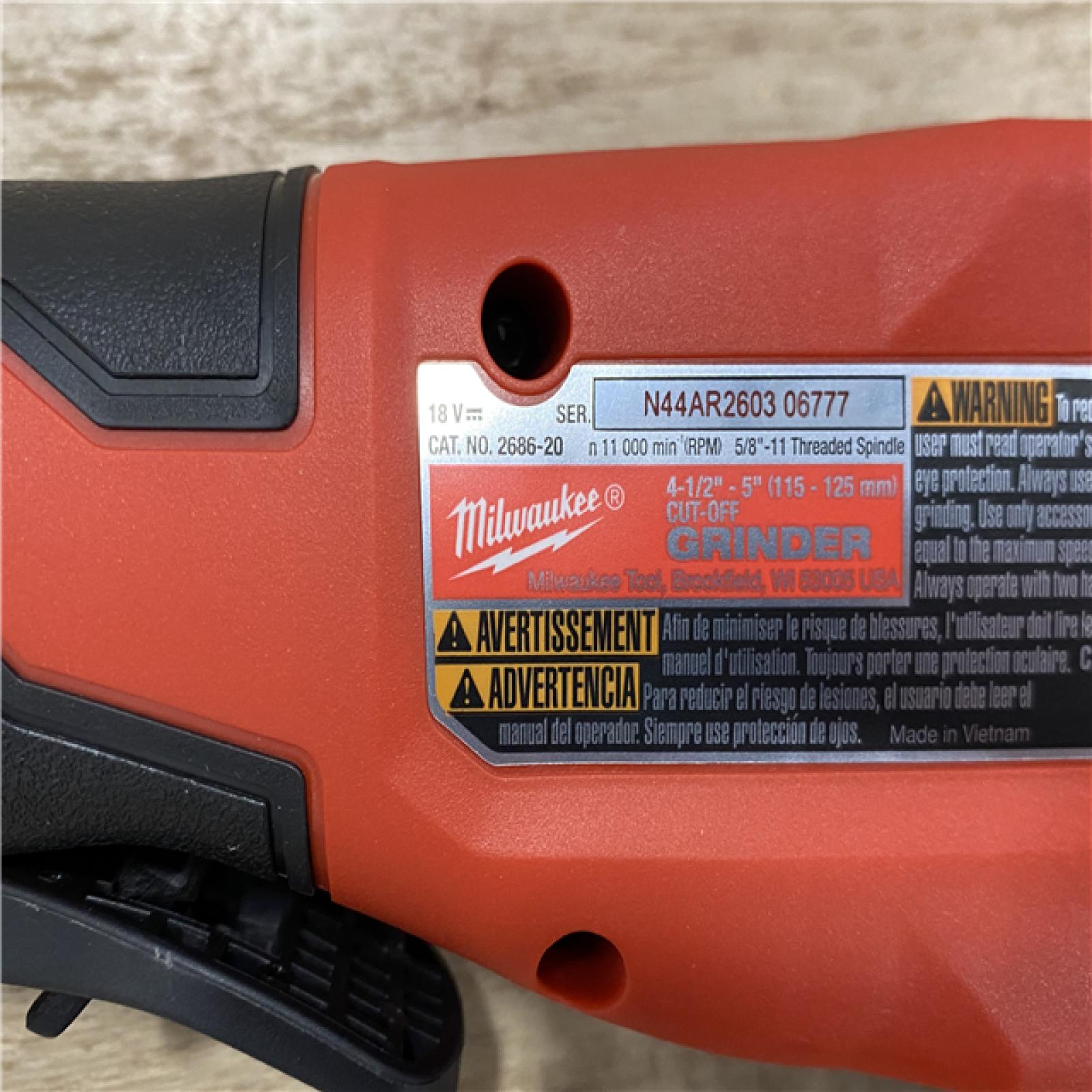 AS-IS Milwaukee 18V Lithium-Ion Brushless Cordless 4-1/2 in./5 in. Grinder w/Paddle Switch (Tool-Only)