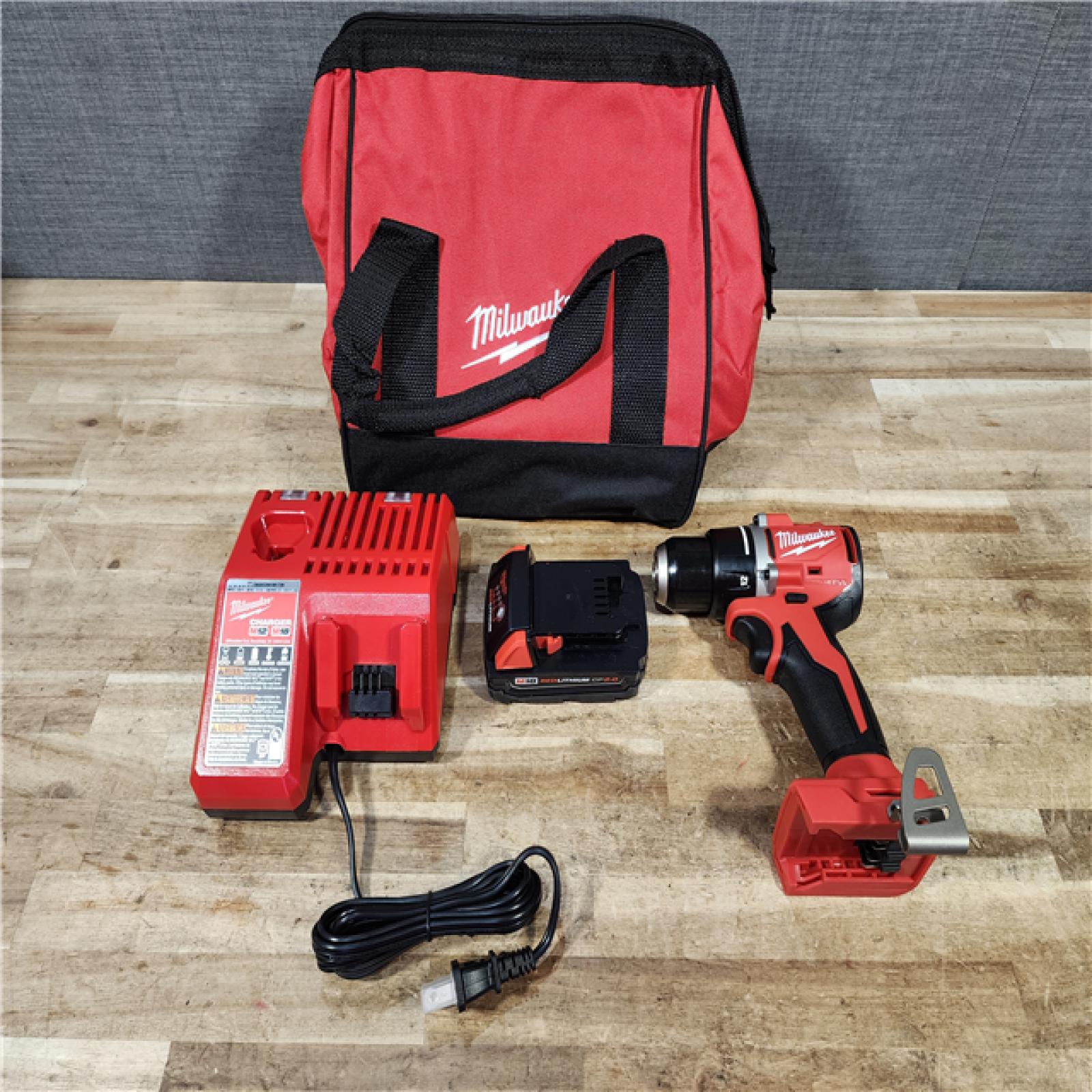 HOUSTON LOCATION - AS - IS Milwaukee 18V Lithium-Ion Brushless Cordless 1/2 in. Compact Drill/Driver with kit