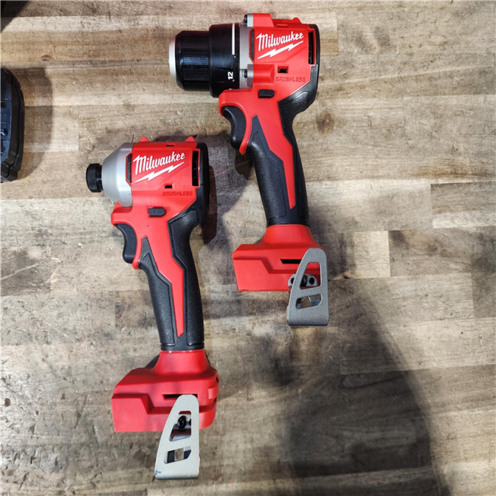 HOUSTON LOCATION - AS-IS Milwaukee M18 18V Lithium-Ion Brushless Cordless Compact Drill/Impact Combo Kit (2-Tool) W/(2) 2.0 Ah Batteries  Charger & Bag