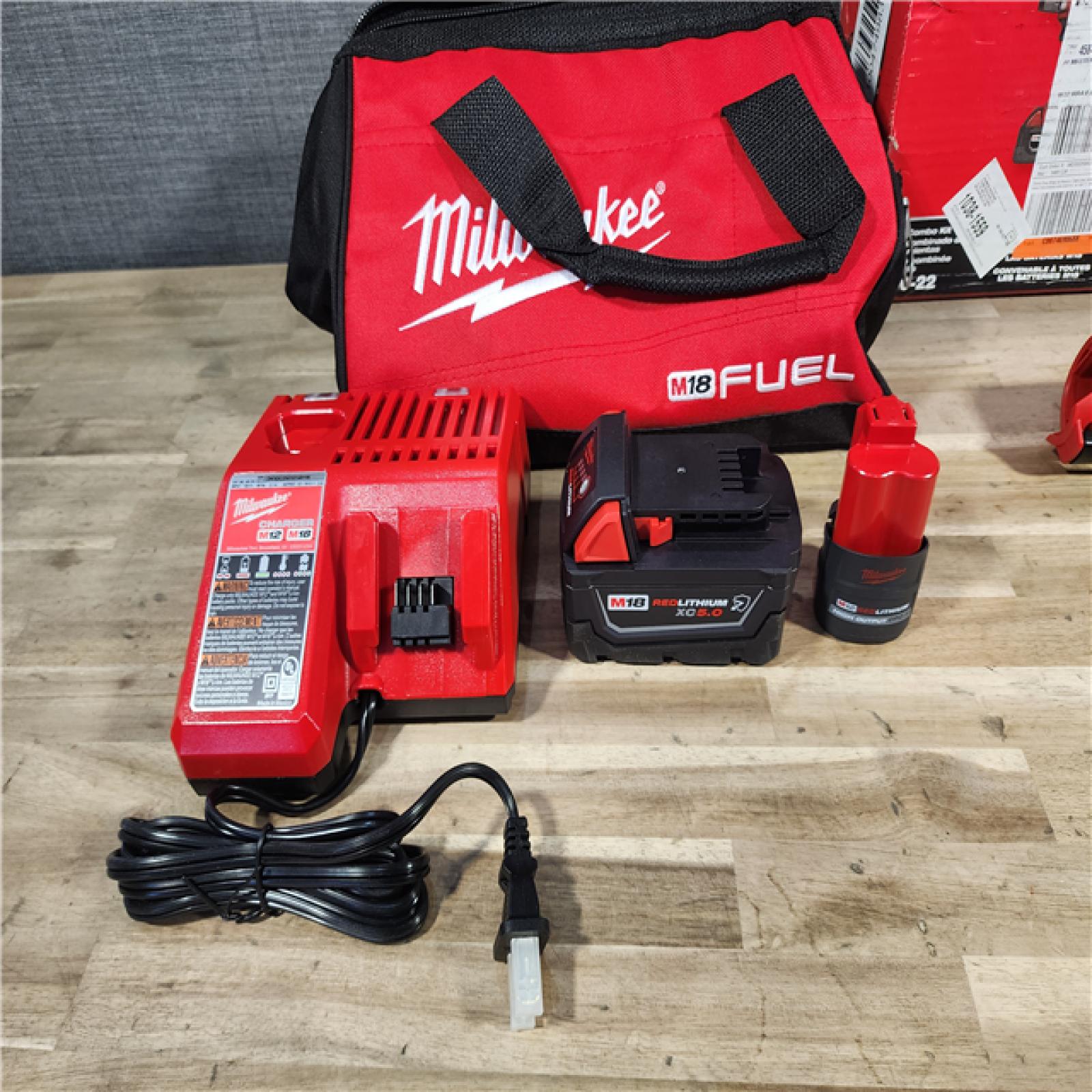 HOUSTON LOCATION - AS-IS (APPEARS LIKE NEW) M18 FUEL 18V Cordless Mid Torque 1/2 in. Impact Wrench W/ M12 FUEL 3/8 in. Ratchet & Battery/Charger Combo Kit