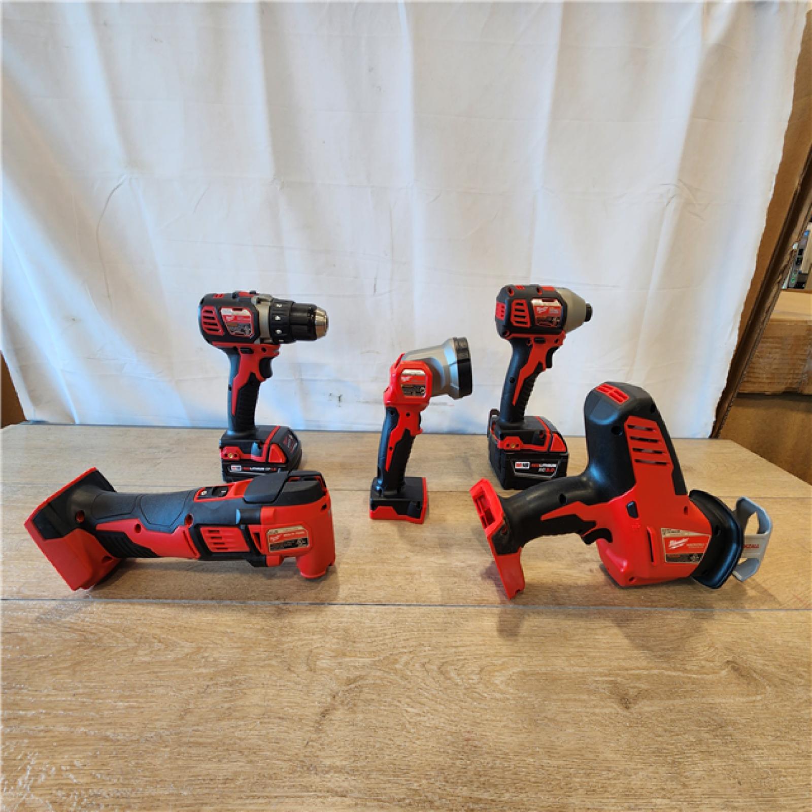 AS-IS- M18 18V Lithium-Ion Cordless Combo Kit (5-Tool) with (2) Batteries  Charger and Tool Bag