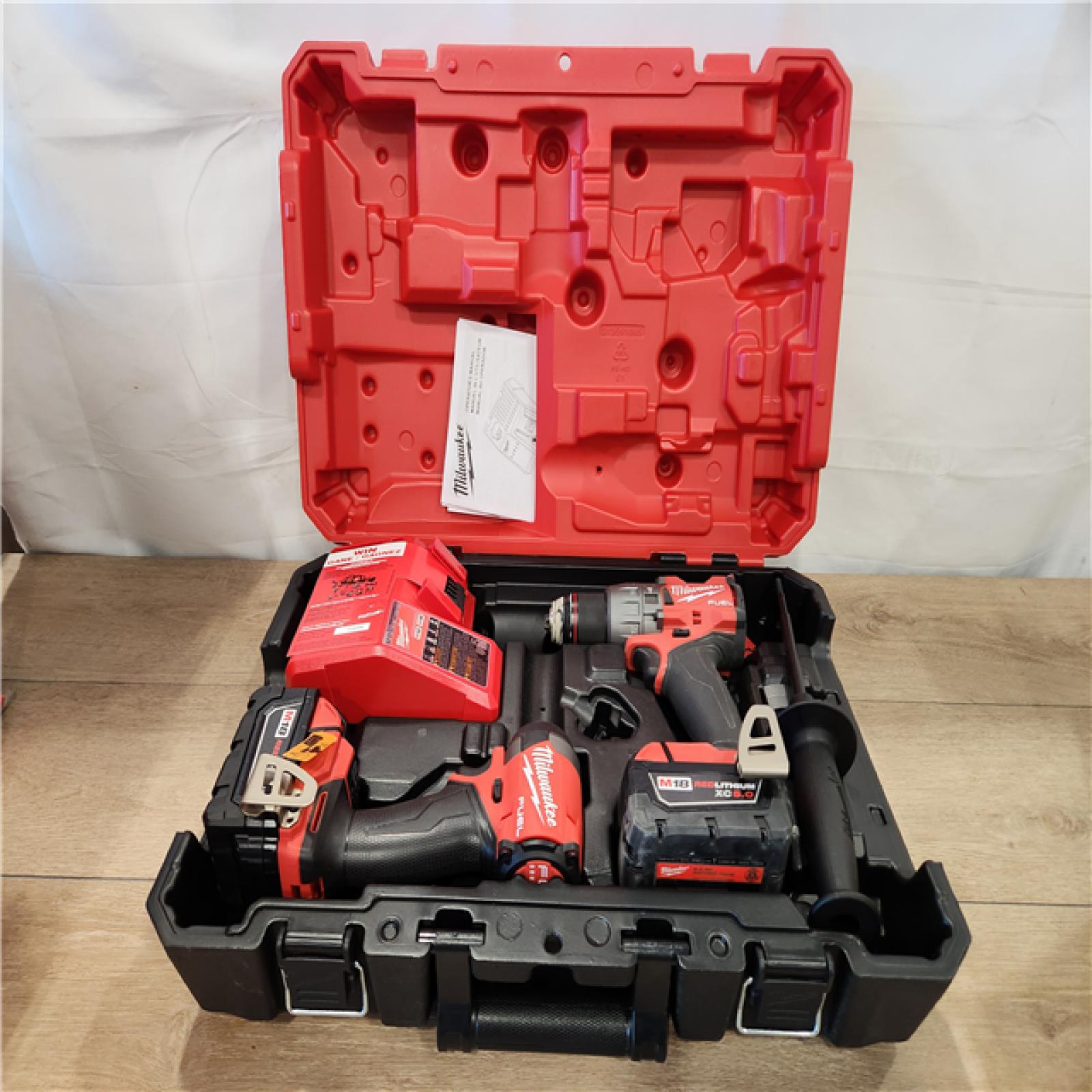 AS-IS- Milwaukee  FUEL 18V Lithium-Ion Brushless Cordless Hammer Drill and Impact Driver Combo Kit