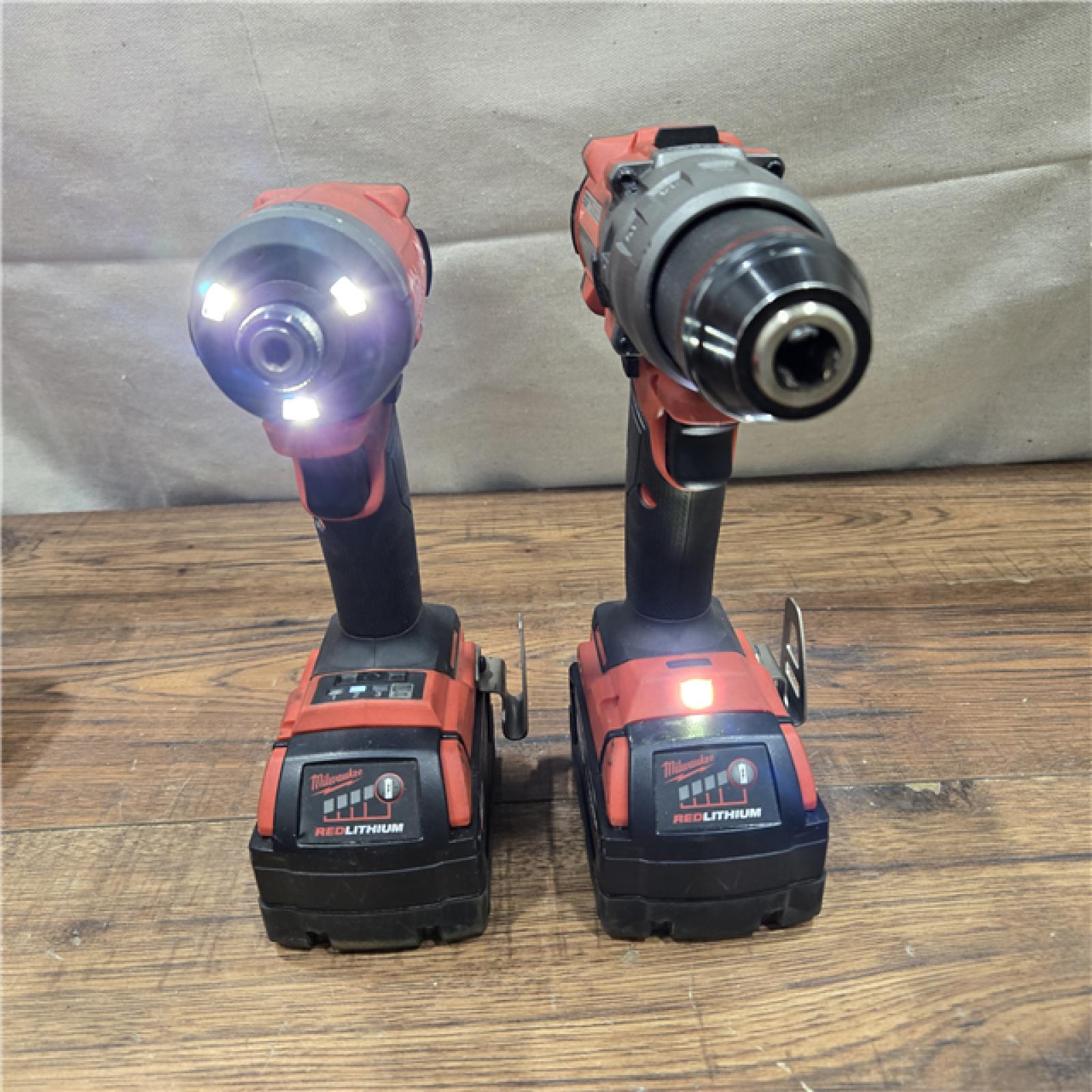 AS-IS MILWAUKEE M18 FUEL 18V Lithium-Ion Brushless Cordless Hammer Drill and Impact Driver Combo Kit (2-Tool) with 2 Batteries
