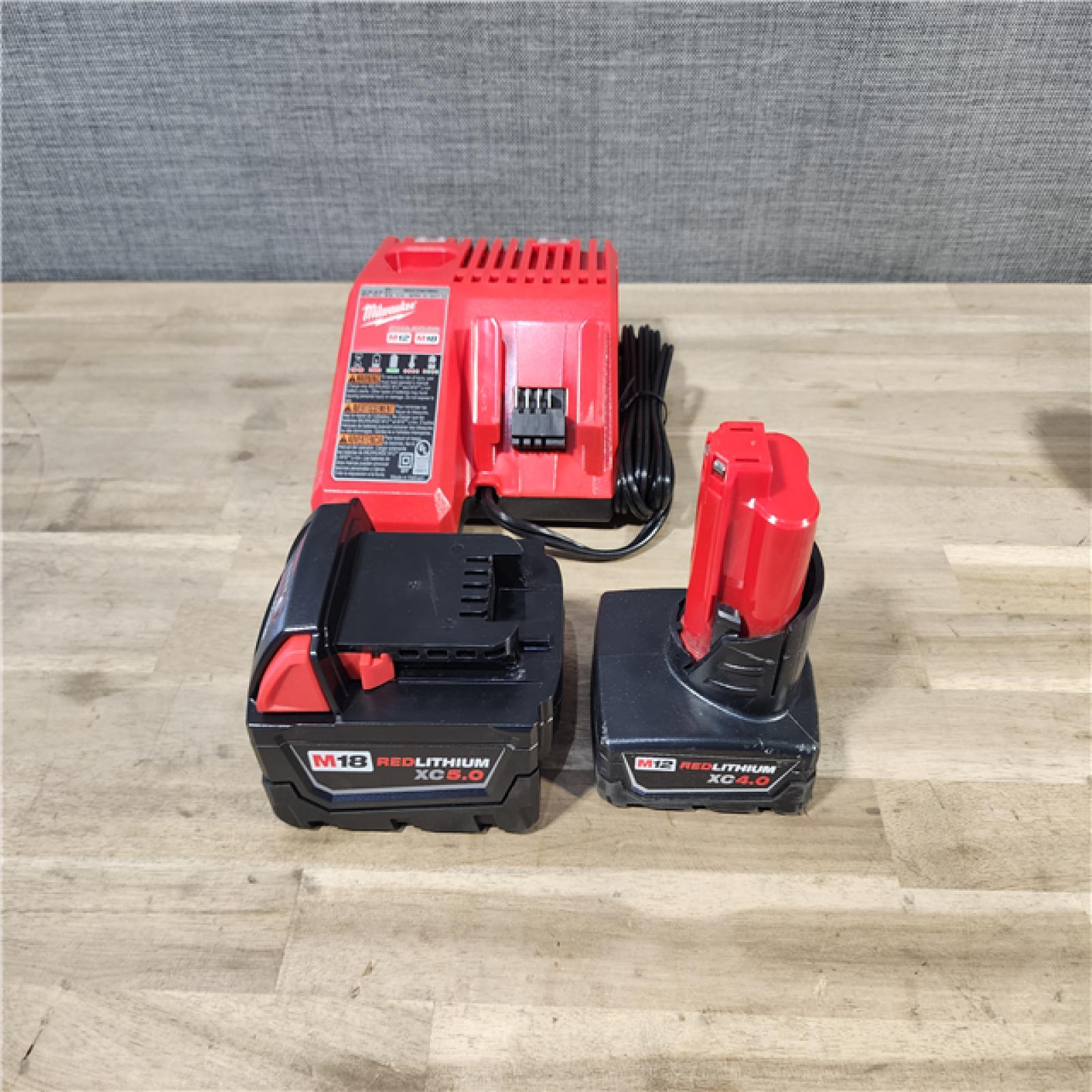 HOUSTON LOCATION - AS-IS Milwaukee 2 Tool Combo Kit W/ (2) Battery & Charger