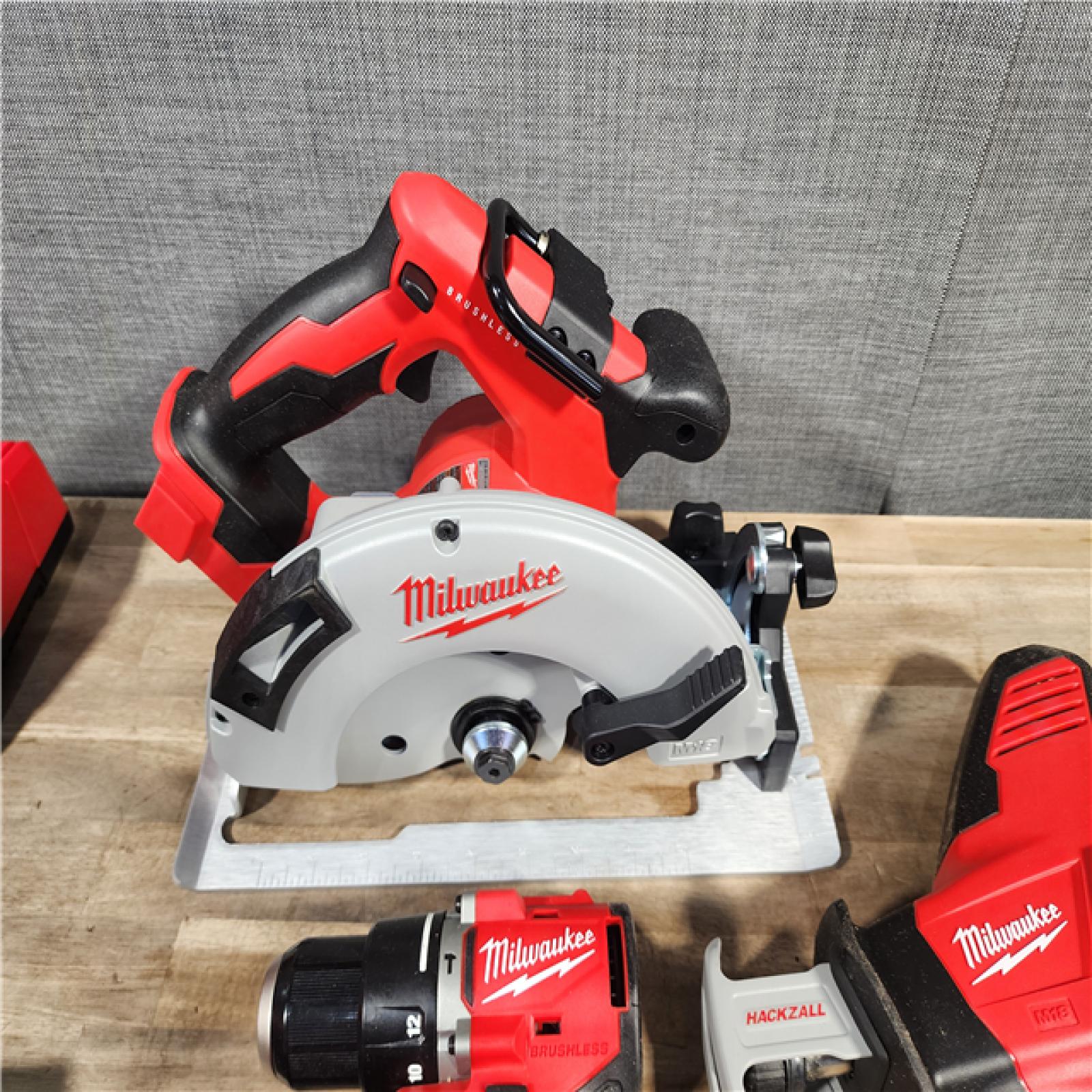 HOUSTON LOCATION - AS-IS (APPEARS LIKE NEW) Milwaukee M18 18-Volt Lithium-Ion Brushless Cordless Combo Kit (4-Tool) with 2-Batteries, 1-Charger and Tool Bag