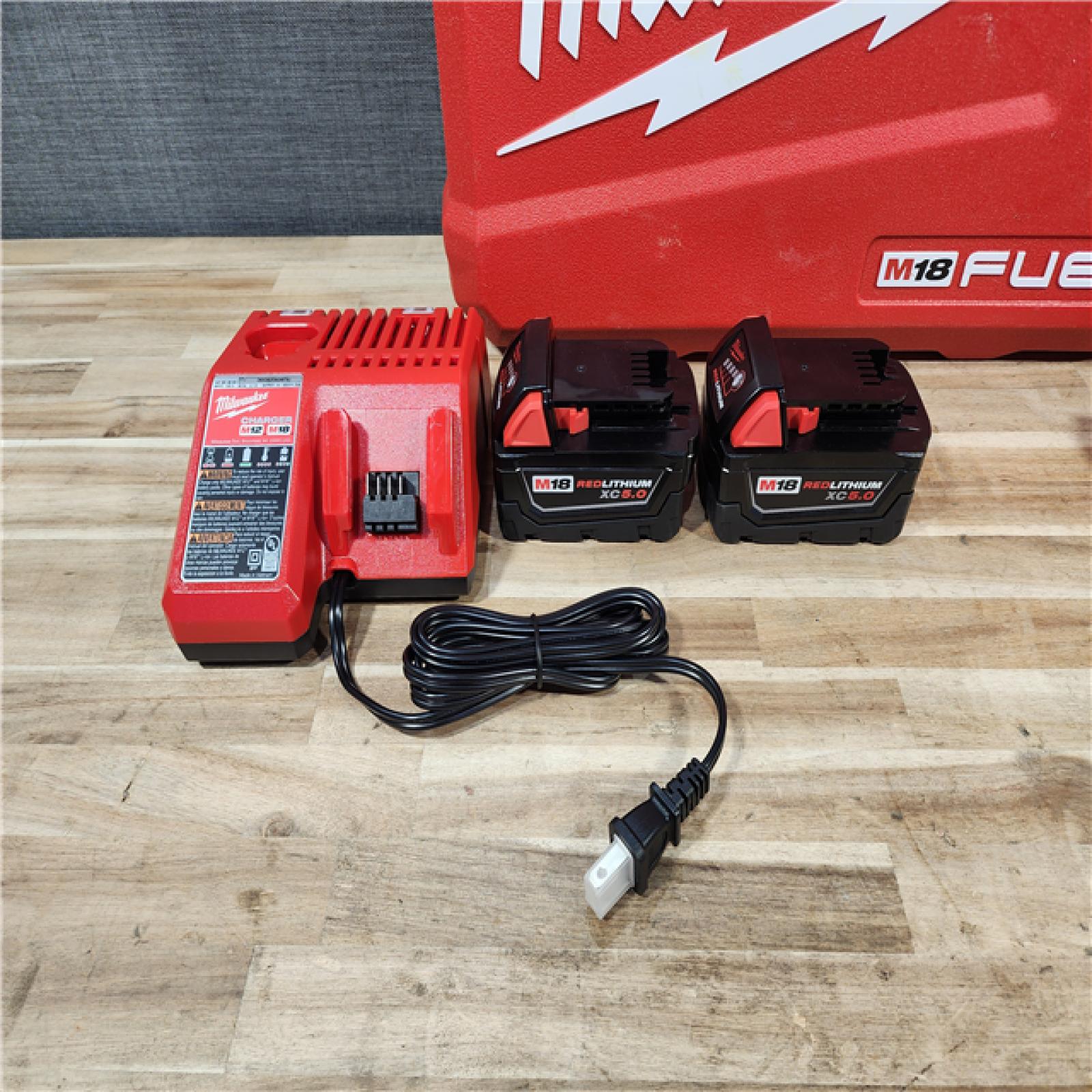 HOUSTON LOCATION - AS-IS (APPEARS LIKE NEW) Milwaukee FUEL 18V Lithium-Ion Brushless Cordless Hammer Drill and Impact Driver Combo Kit