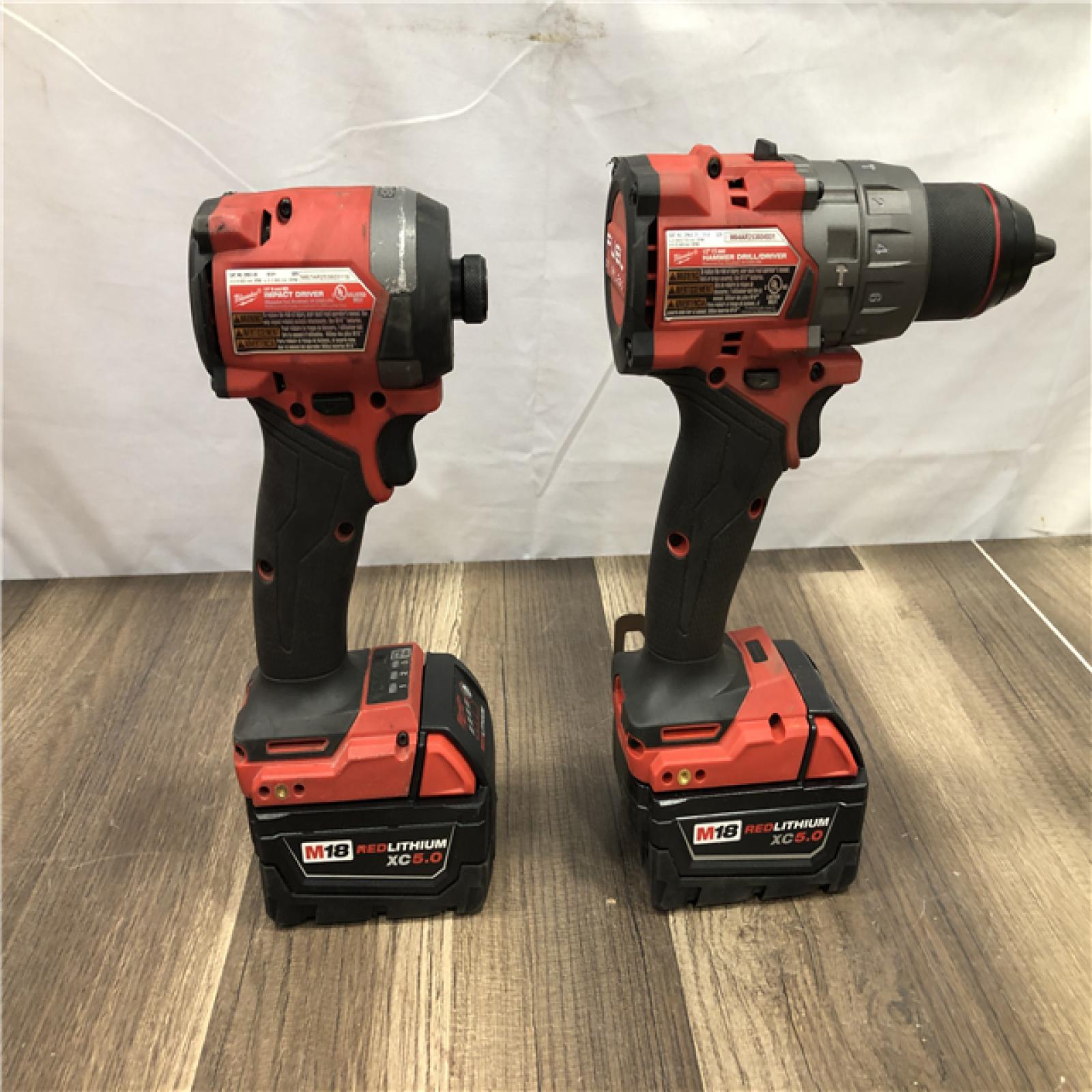 AS-IS Milwaukee  FUEL 18V Lithium-Ion Brushless Cordless Hammer Drill and Impact Driver Combo Kit