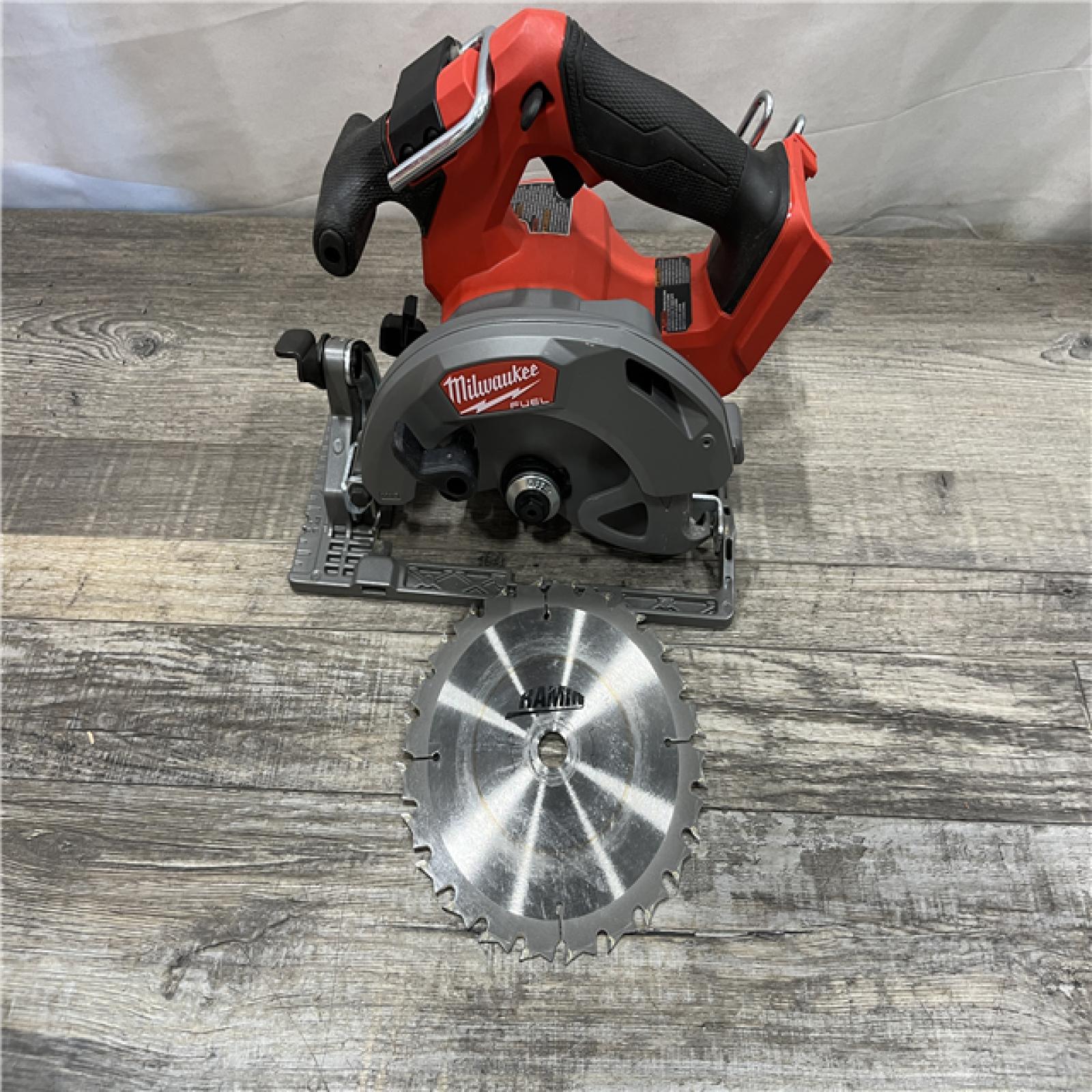 AS-IS Milwaukee FUEL 18V Lithium-Ion Brushless Cordless 6-1/2 in. Circular Saw (Tool-Only)