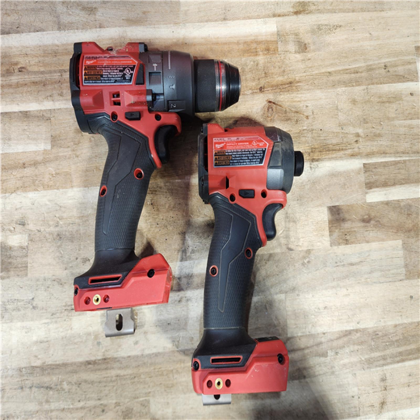 HOUSTON LOCATION - AS-IS Milwaukee FUEL 18V Lithium-Ion Brushless Cordless Hammer Drill and Impact Driver Combo Kit