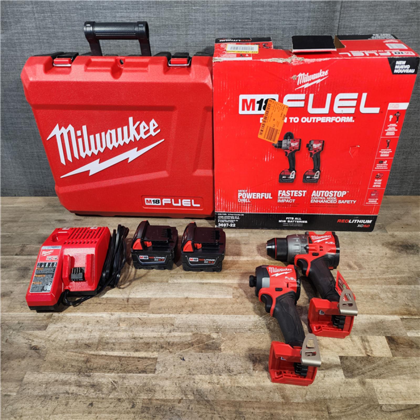 HOUSTON LOCATION - AS-IS Milwaukee FUEL 18V Lithium-Ion Brushless Cordless Hammer Drill and Impact Driver Combo Kit