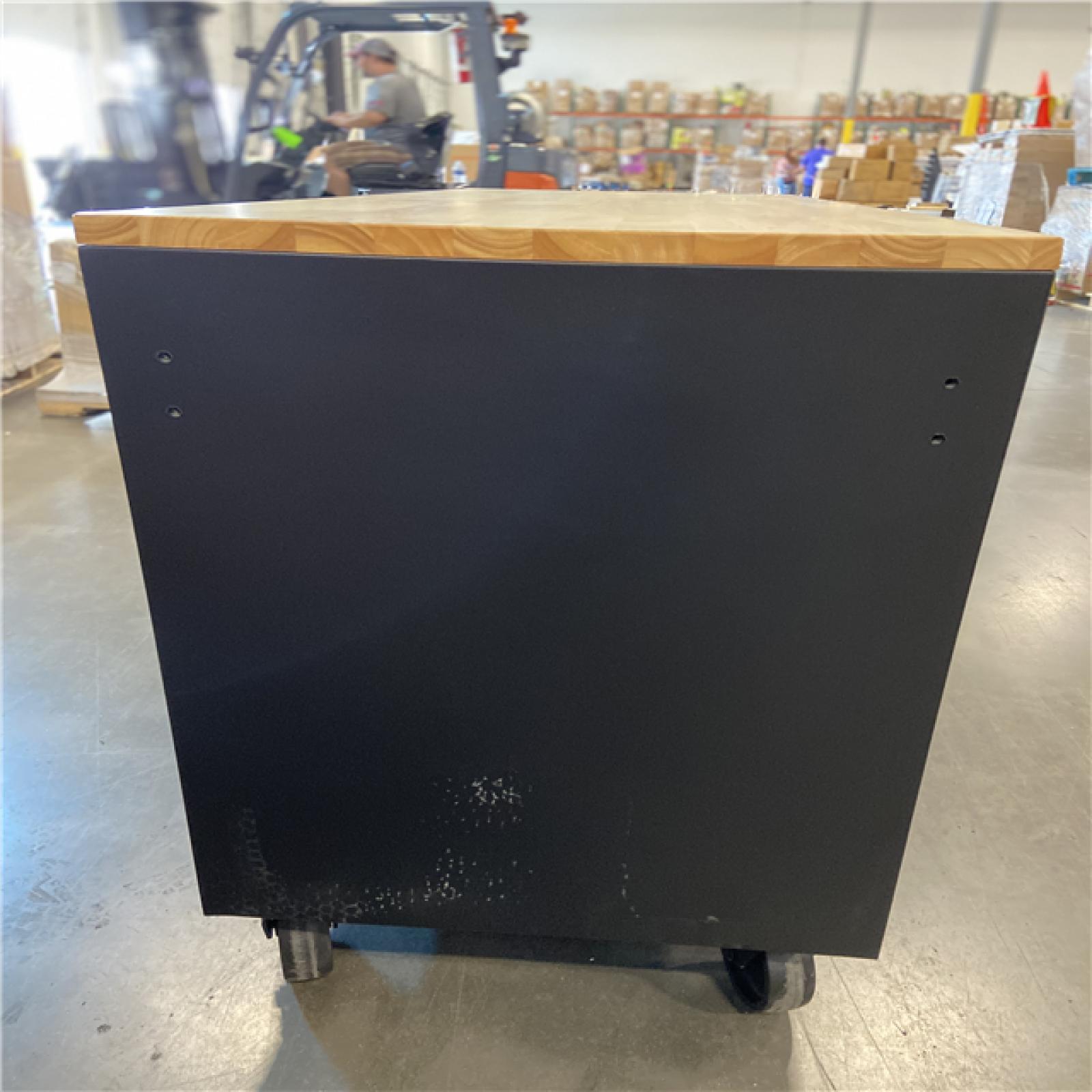 DALLAS LOCATION - Husky 61 in. W x 23 in. D Heavy Duty 15-Drawer Mobile Workbench Tool Chest with Solid Wood Top in Matte Black