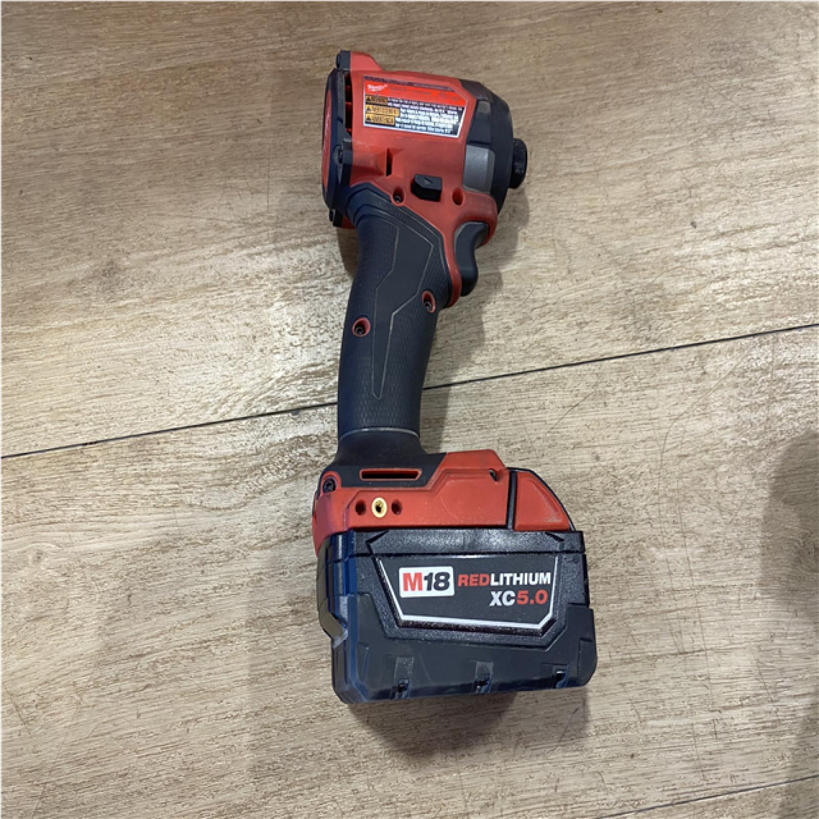 AS-IS Milwaukee FUEL 18V Lithium-Ion Brushless Cordless Hammer Drill and Impact Driver Combo Kit