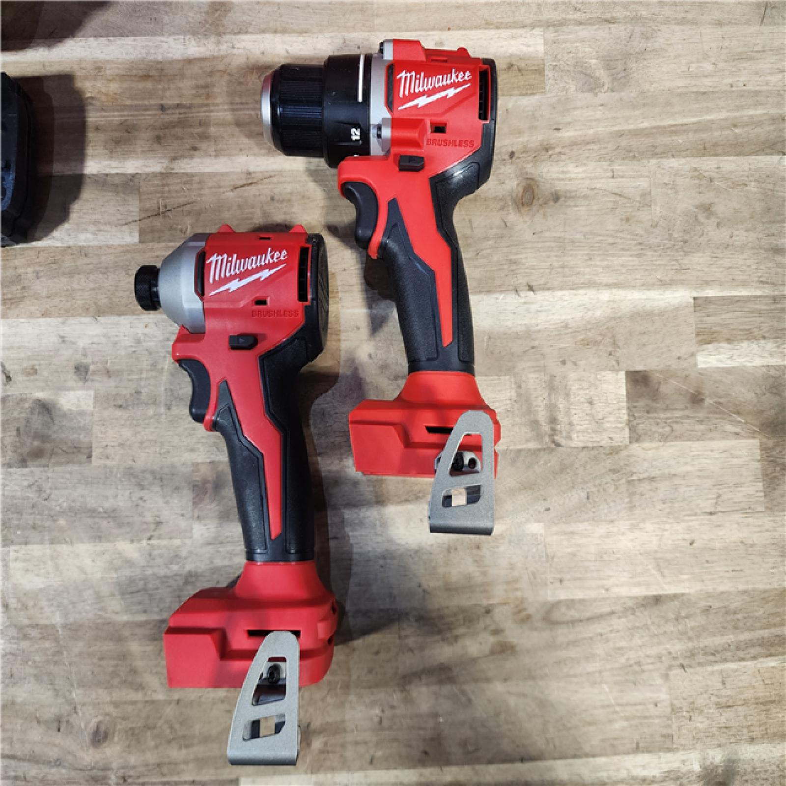 HOUSTON LOCATION - AS-IS Milwaukee M18 18V Lithium-Ion Brushless Cordless Compact Drill/Impact Combo Kit (2-Tool) W/(2) 2.0 Ah Batteries, Charger & Bag