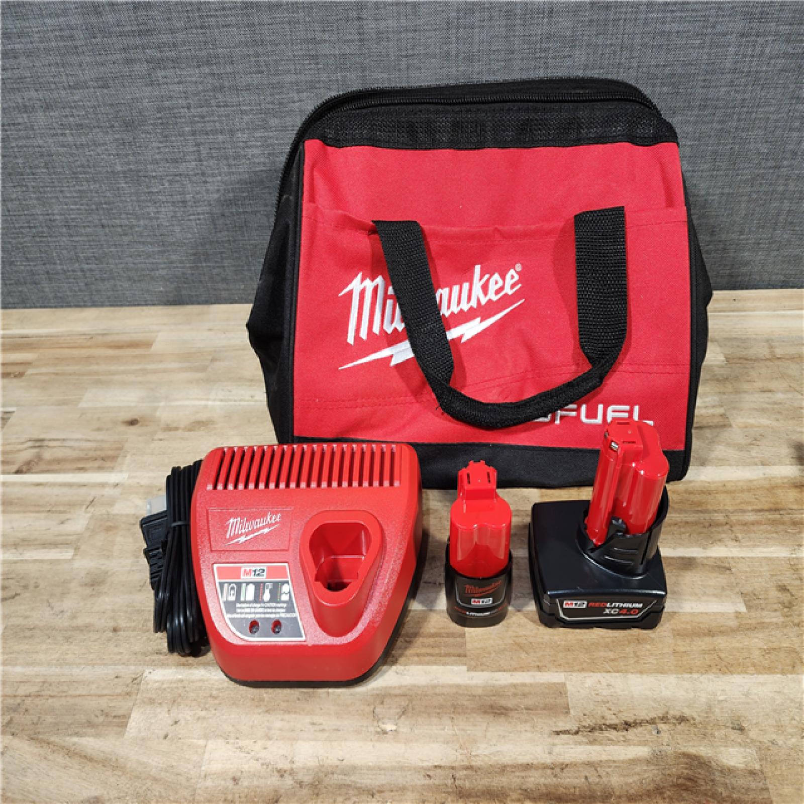 HOUSTON LOCATION - AS-IS (APPEARS LIKE NEW) Milwaukee FUEL 12-Volt Lithium-Ion Brushless Cordless Hammer Drill and Impact Driver Combo Kit