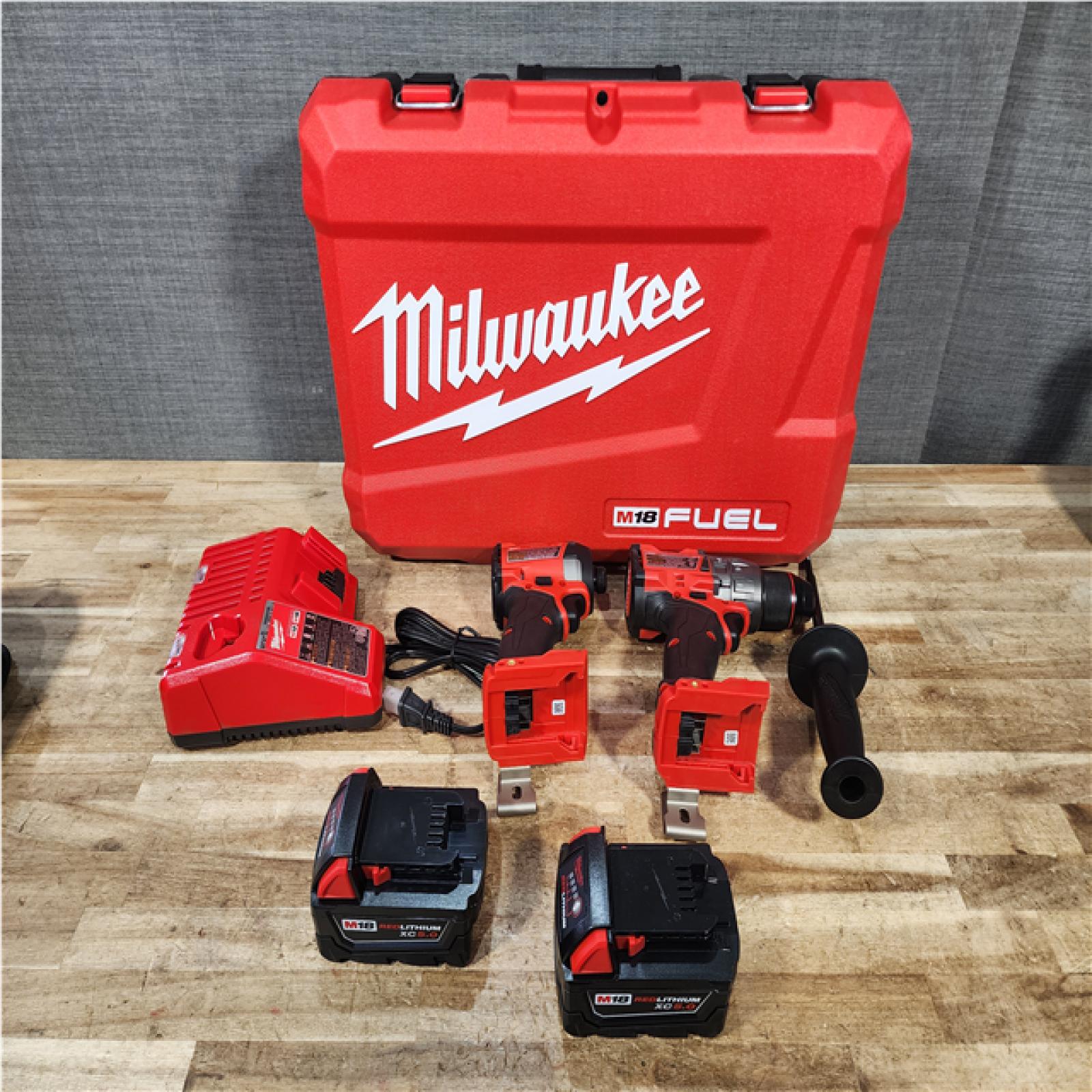 Houston Location AS-IS Milwaukee FUEL 18V Lithium-Ion Brushless Cordless Hammer Drill and Impact Driver Combo Kit