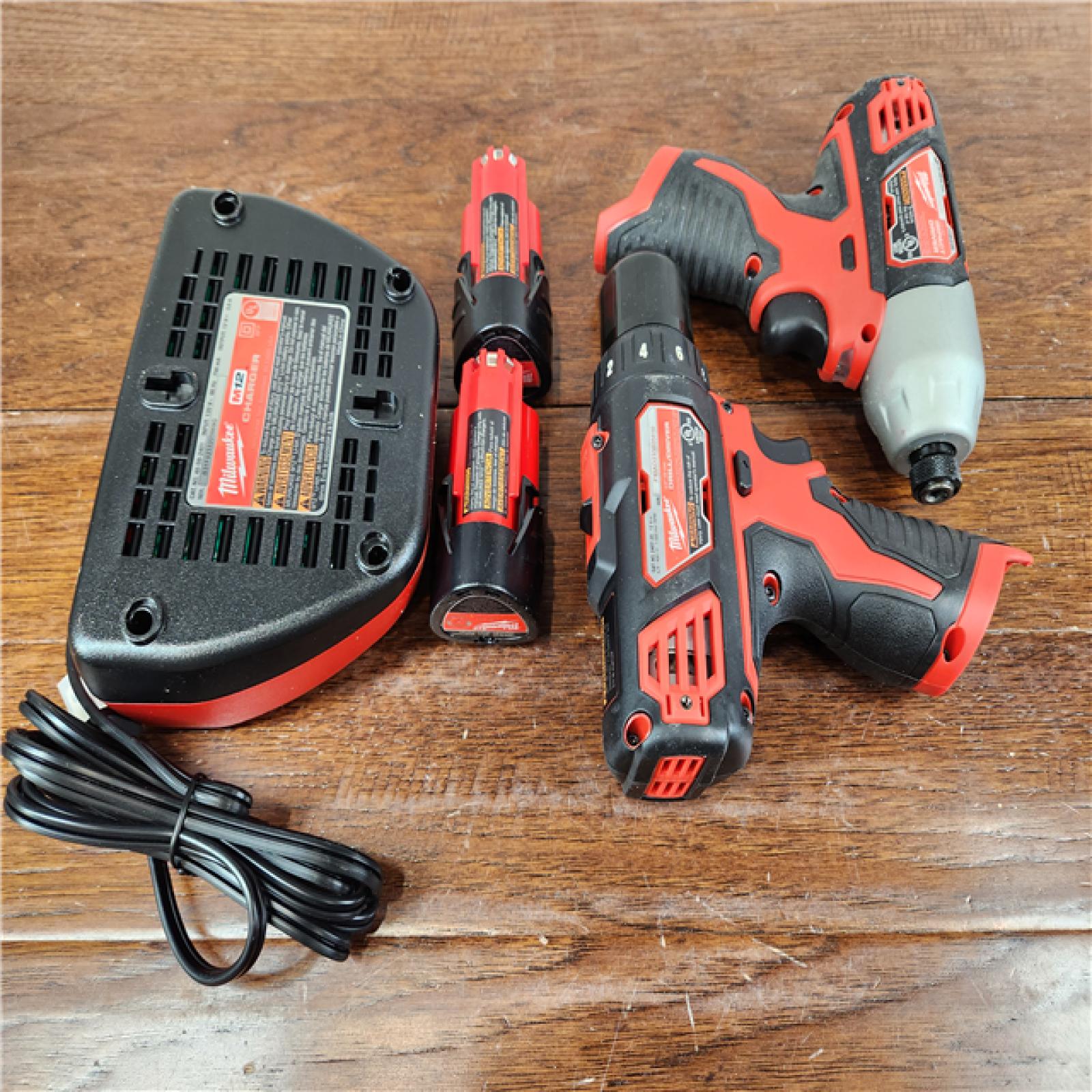 AS-IS Milwaukee M12 Brushed Cordless (4-Tool) Combo Kit