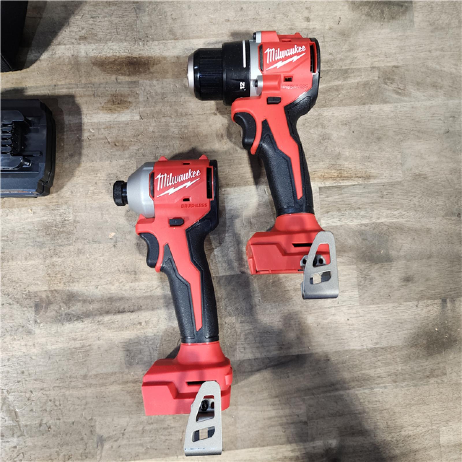 HOUSTON LOCATION - AS-IS Milwaukee M18 18V Lithium-Ion Brushless Cordless Compact Drill/Impact Combo Kit (2-Tool) W/(2) 2.0 Ah Batteries  Charger & Bag