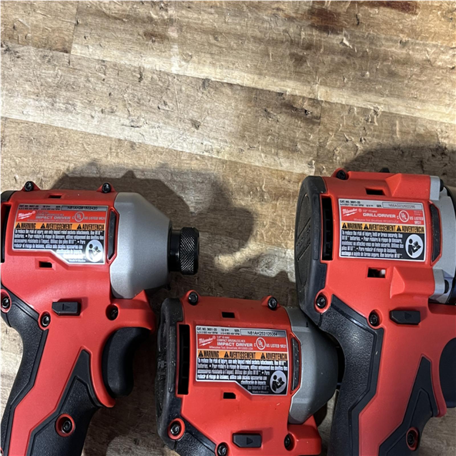 Houston Location AS-IS Milwaukee Drill Driver and Impact Drivers QTY/2 and Batteries QTY/2 with Charger