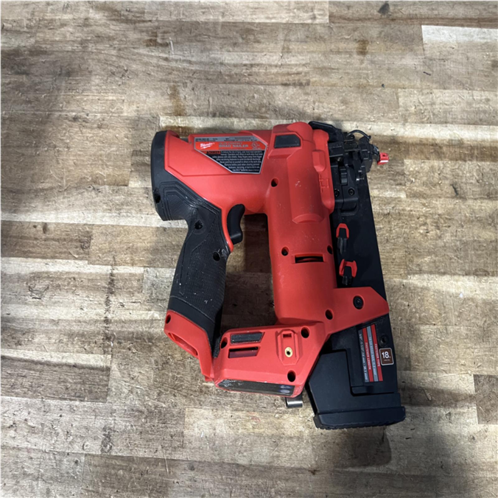 Houston Location AS-IS Milwaukee FUEL 12-Volt Lithium-Ion Brushless Cordless 18-Gauge 1-1/2 in. Compact Brad Nailer (Tool Only)