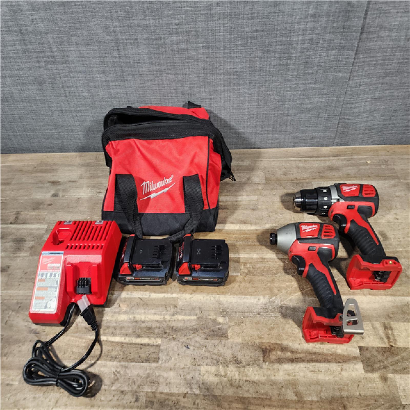 HOUSTON LOCATION - AS-IS Milwaukee M18 Brushed Cordless (2-Tool) Drill/Driver and Impact Driver Kit
