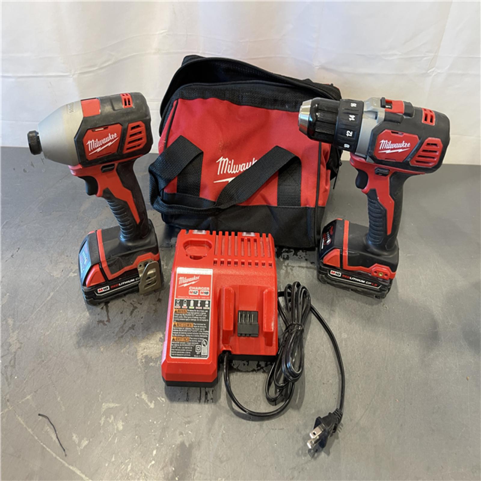 AS-IS - Milwaukee M18 18V Lithium-Ion Cordless Drill Driver/Impact Driver Combo Kit (2-Tool)