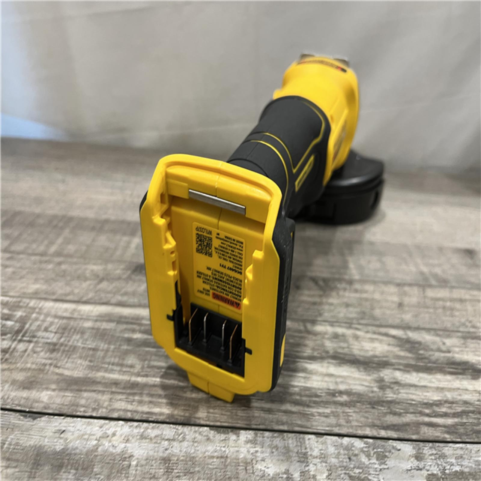 AS-IS DEWALT 20-Volt MAX Cordless Brushless 4-1/2 in. Angle Grinder with Slide Switch (Tool Only)