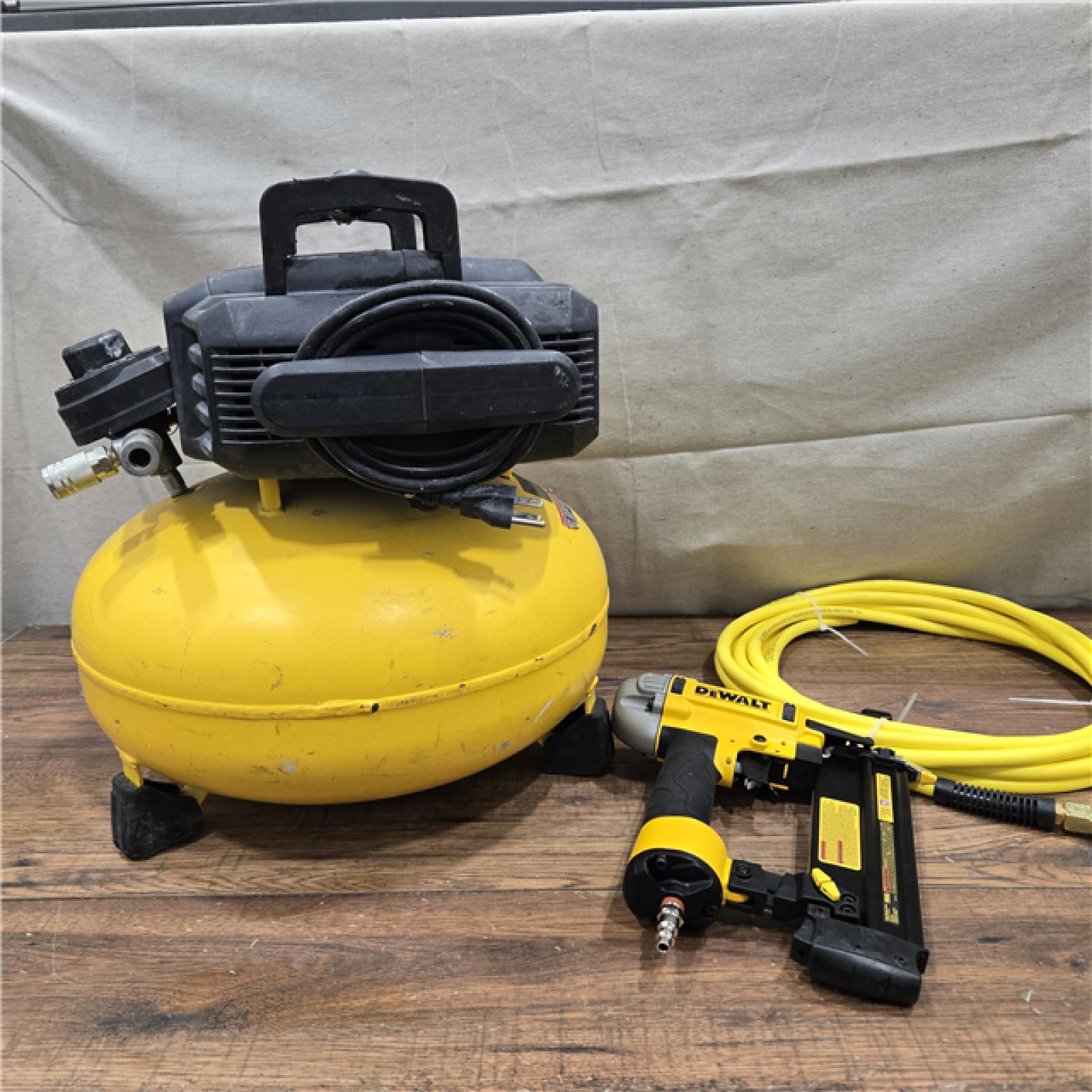 AS-IS DEWALT 6 Gal. 18-Gauge Brad Nailer and Heavy-Duty Pancake Electric Air Compressor Combo Kit